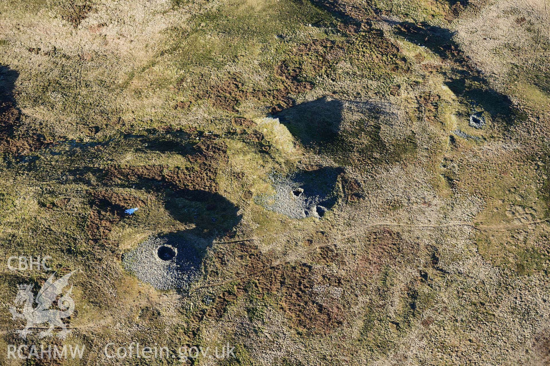 Oblique aerial photograph of Pen Pumlumon Arwystli cairn cemetery. Taken during the Royal Commission’s programme of archaeological aerial reconnaissance by Toby Driver on 17th January 2022