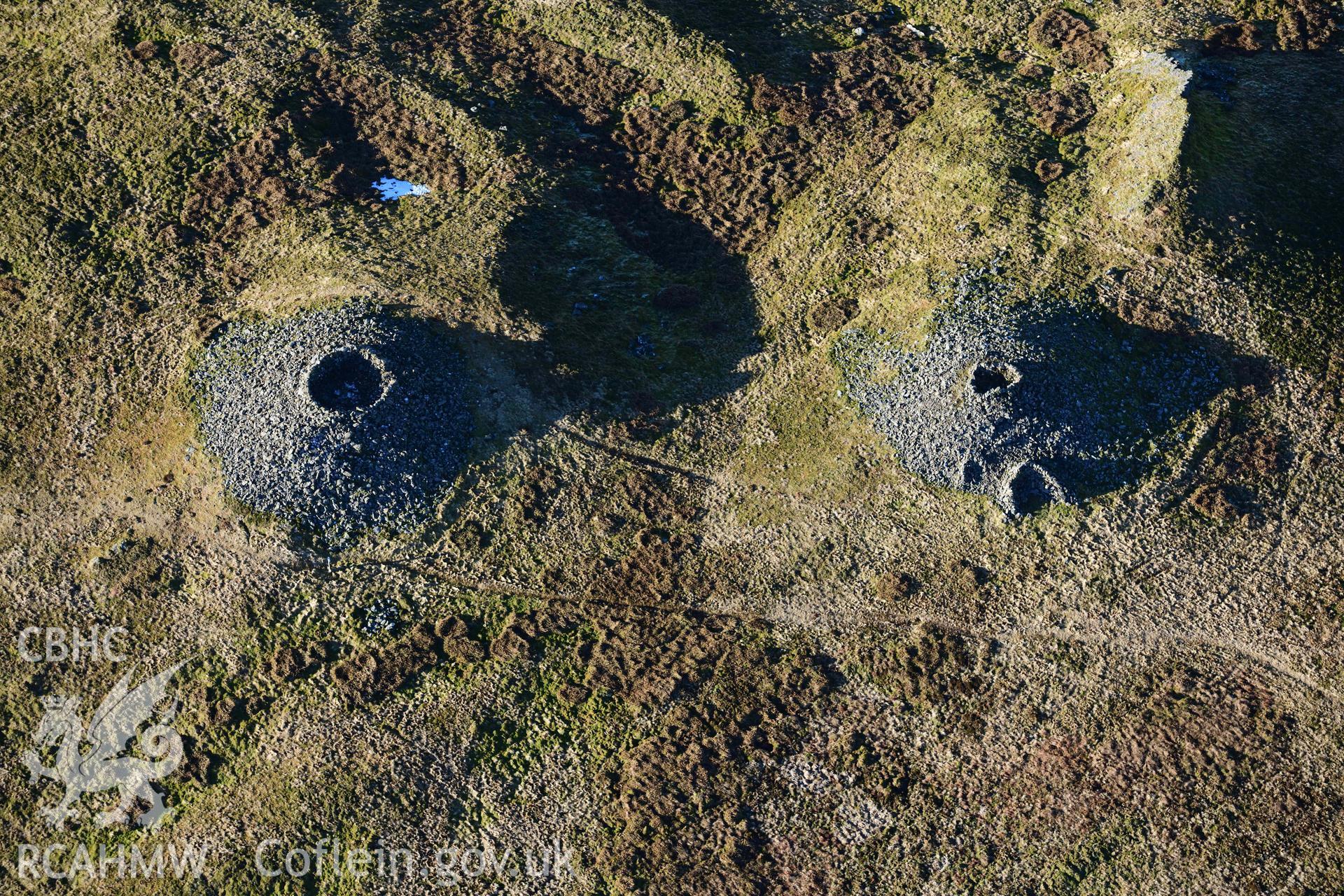 Oblique aerial photograph of Pen Pumlumon Arwystli cairn cemetery. Taken during the Royal Commission’s programme of archaeological aerial reconnaissance by Toby Driver on 17th January 2022