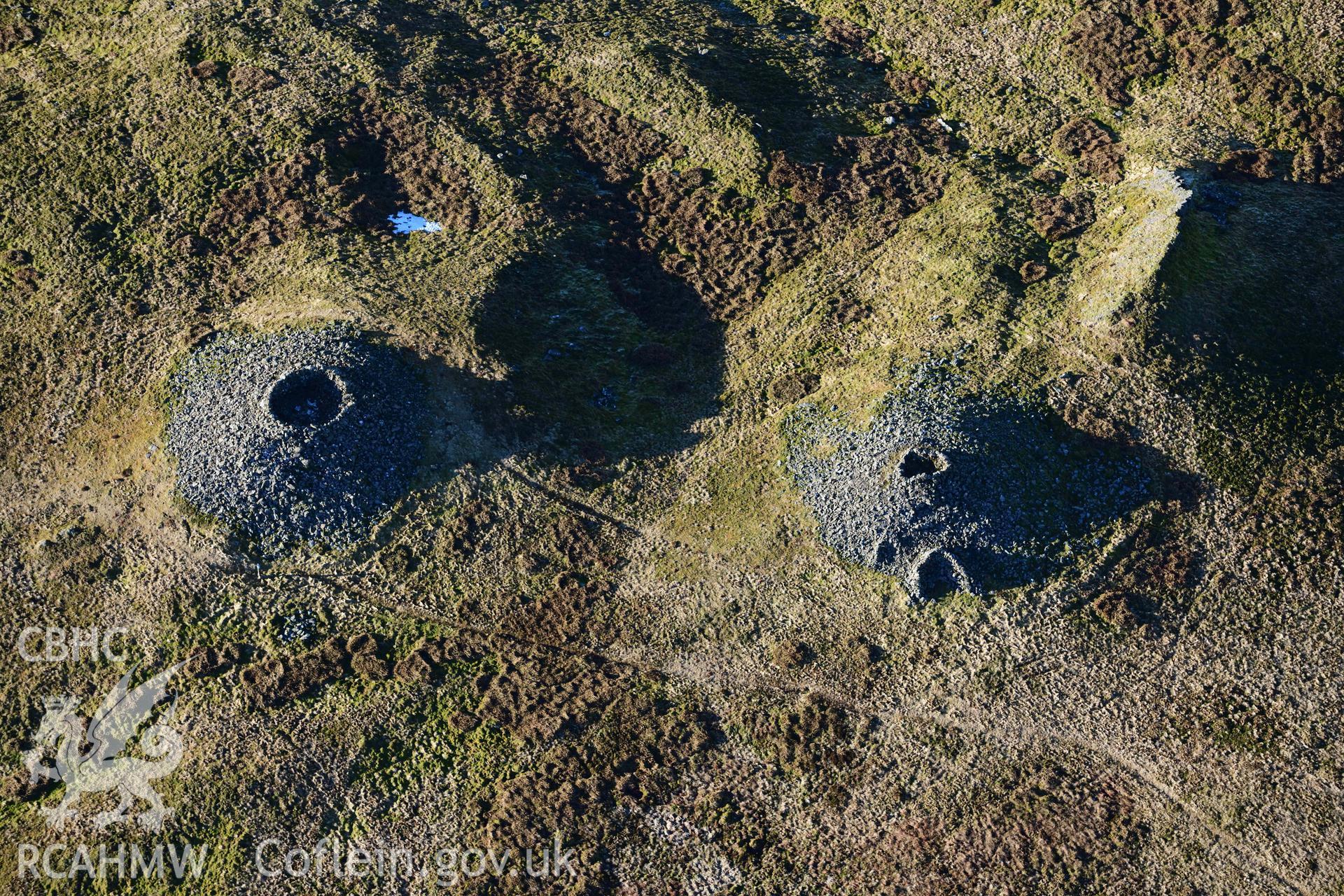 Oblique aerial photograph of Pen Pumlumon Arwystli cairn cemetery. Taken during the Royal Commission’s programme of archaeological aerial reconnaissance by Toby Driver on 17th January 2022