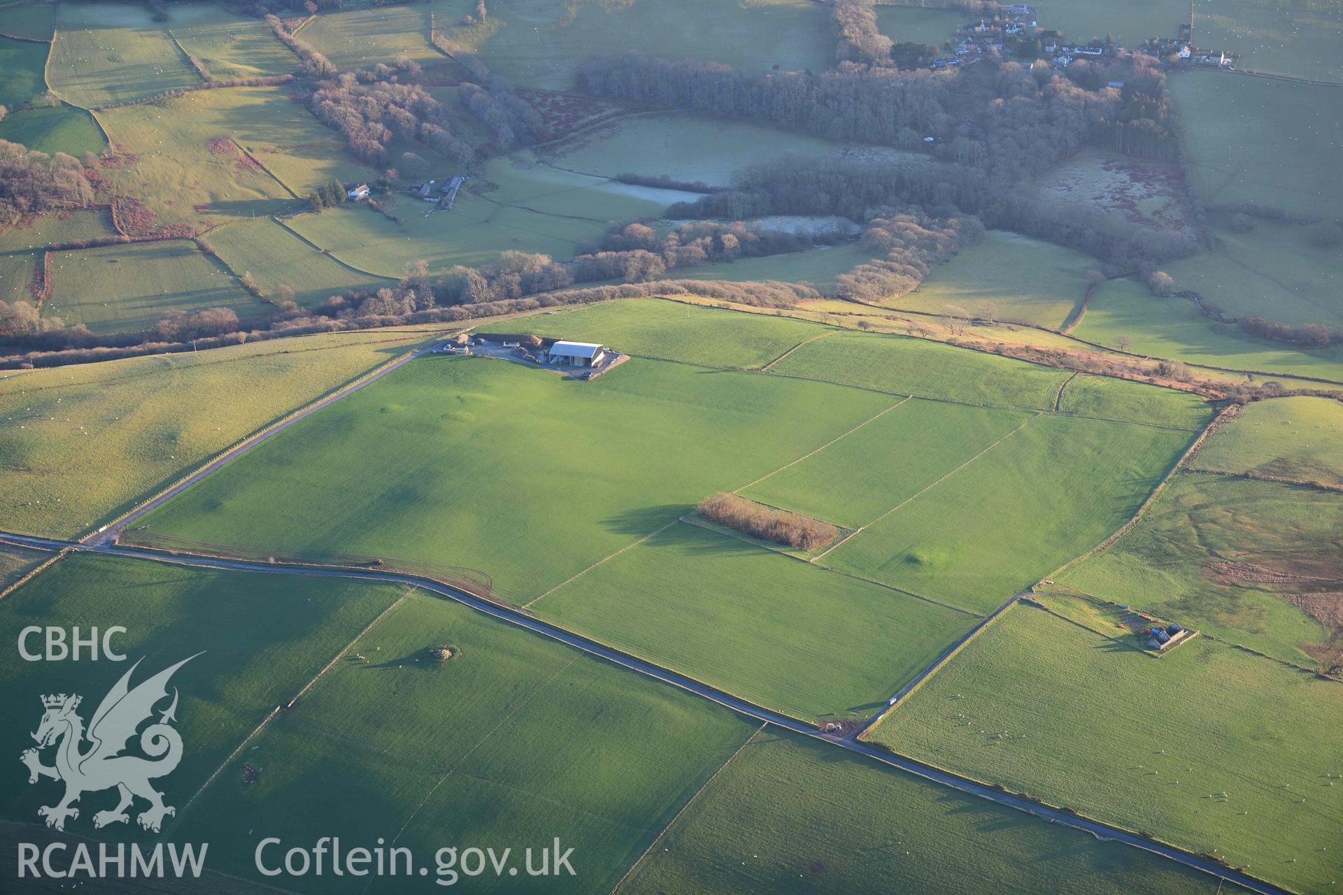 Oblique aerial photograph of Banc Troed Rhiw Seiri round barrow and other barrow earthworks. Taken during the Royal Commission’s programme of archaeological aerial reconnaissance by Toby Driver on 17th January 2022