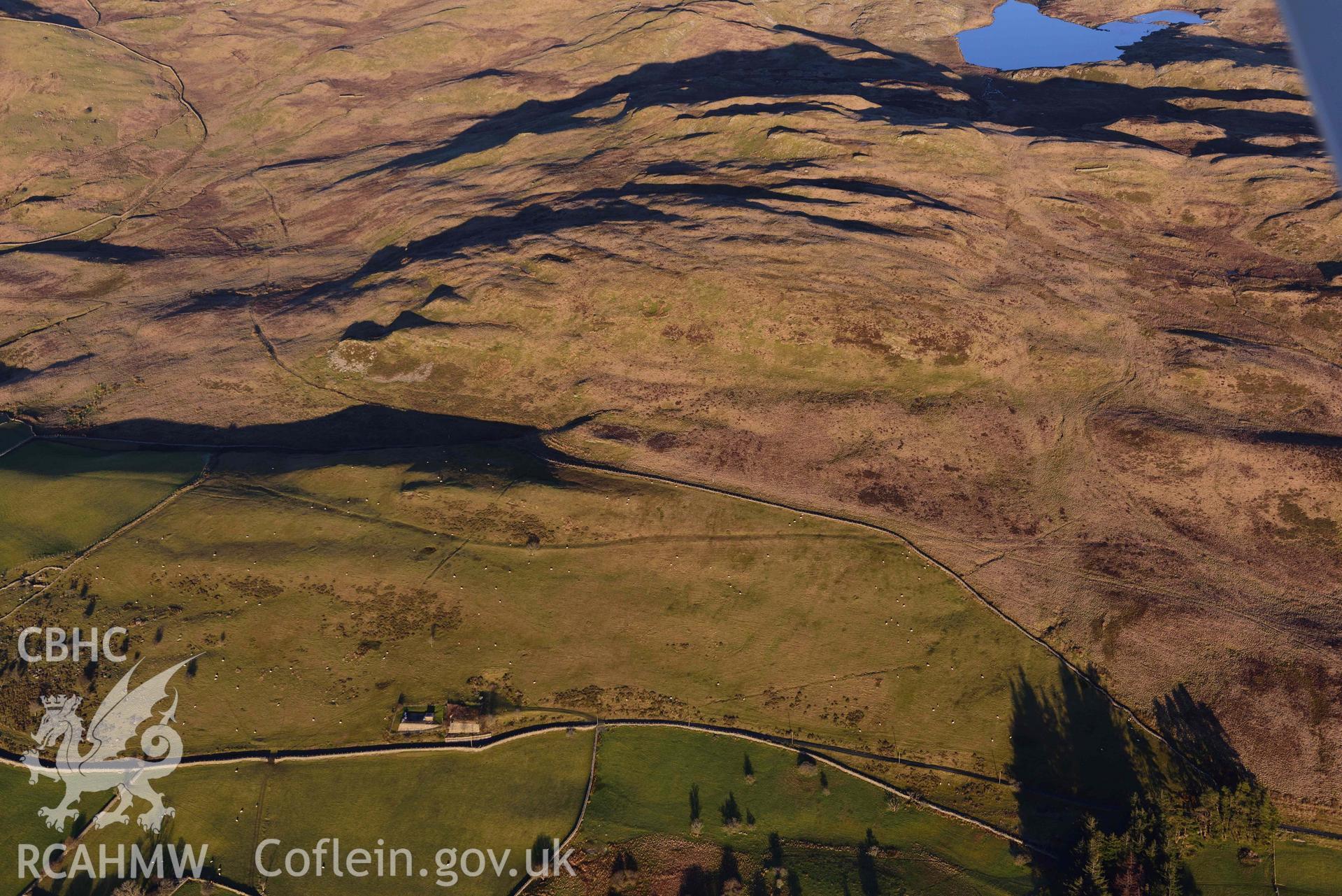 Oblique aerial photograph of Roman road north of Pen y Stryd taken during the Royal Commission’s programme of archaeological aerial reconnaissance by Toby Driver on 17th January 2022