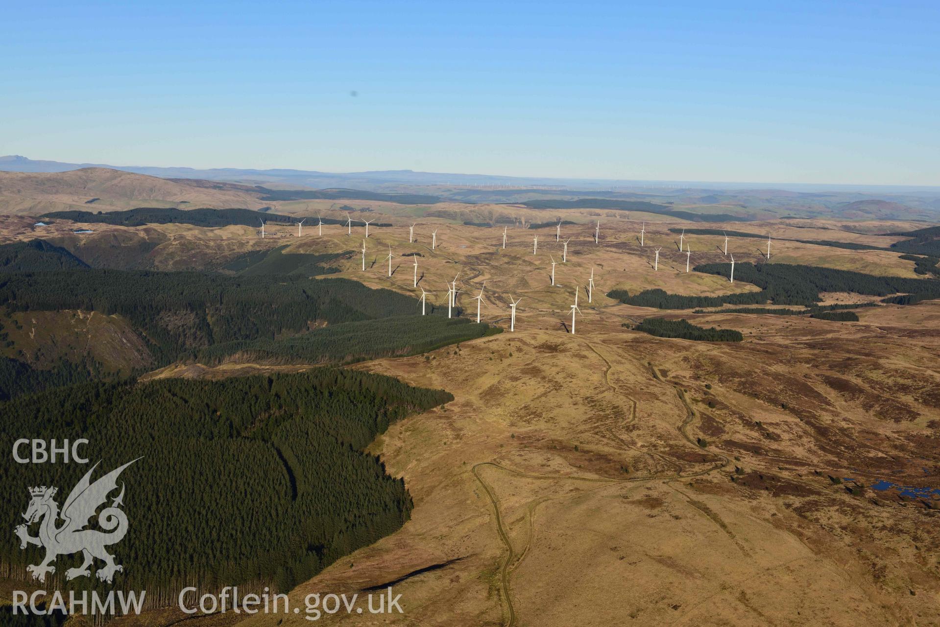 Oblique aerial photograph of Cefn Croes windfarm. Taken from the south west over Pen y Garn during the Royal Commission’s programme of archaeological aerial reconnaissance by Toby Driver on 17th January 2022