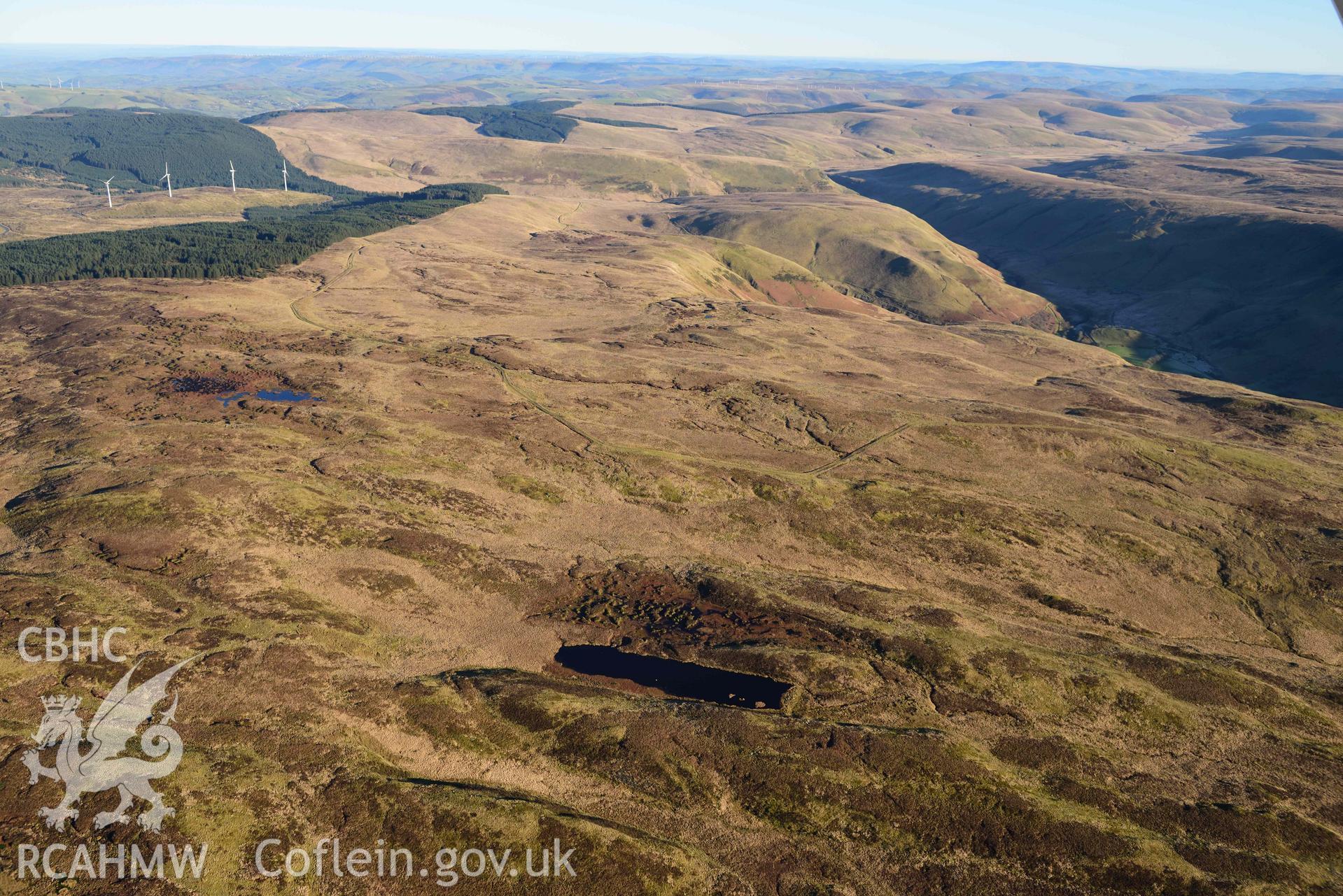 Oblique aerial photograph of Cefn Croes windfarm. Taken from the south west during the Royal Commission’s programme of archaeological aerial reconnaissance by Toby Driver on 17th January 2022