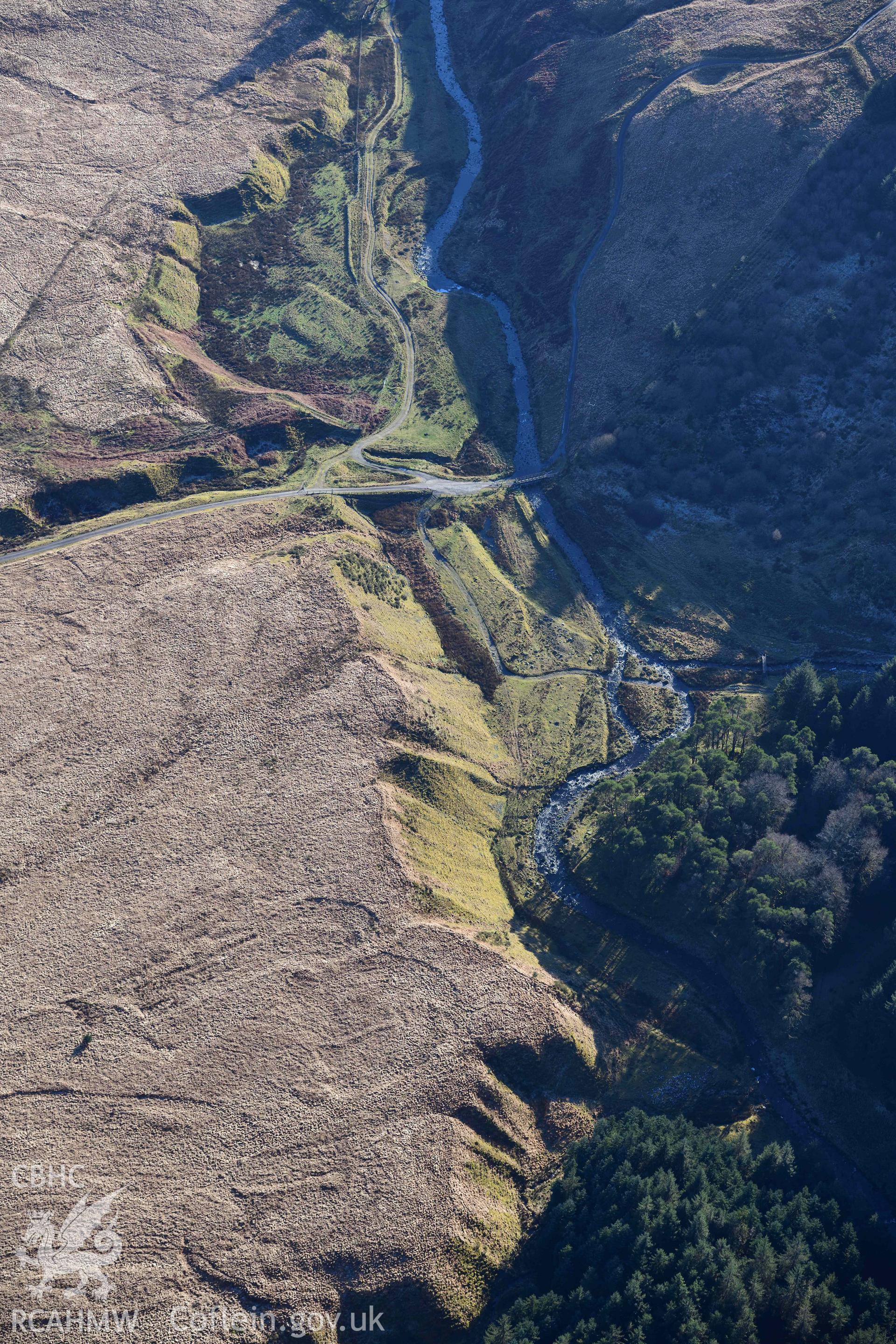 Oblique aerial photograph showing view from the north east of Nant Dilw Fechan deserted rural settlement taken during the Royal Commission’s programme of archaeological aerial reconnaissance by Toby Driver on 17th January 2022