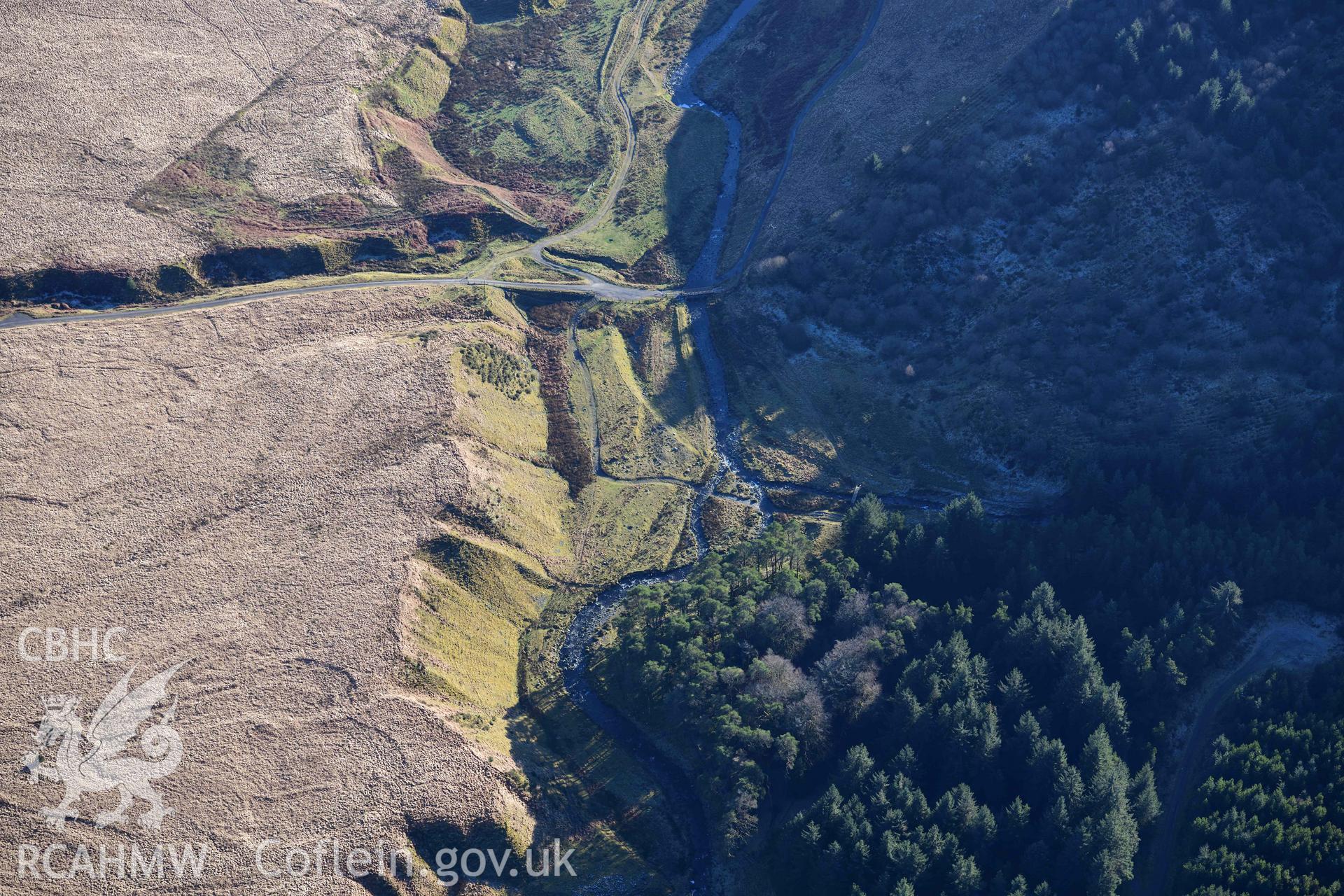 Oblique aerial photograph showing view from the north east of Nant Dilw Fechan deserted rural settlement taken during the Royal Commission’s programme of archaeological aerial reconnaissance by Toby Driver on 17th January 2022