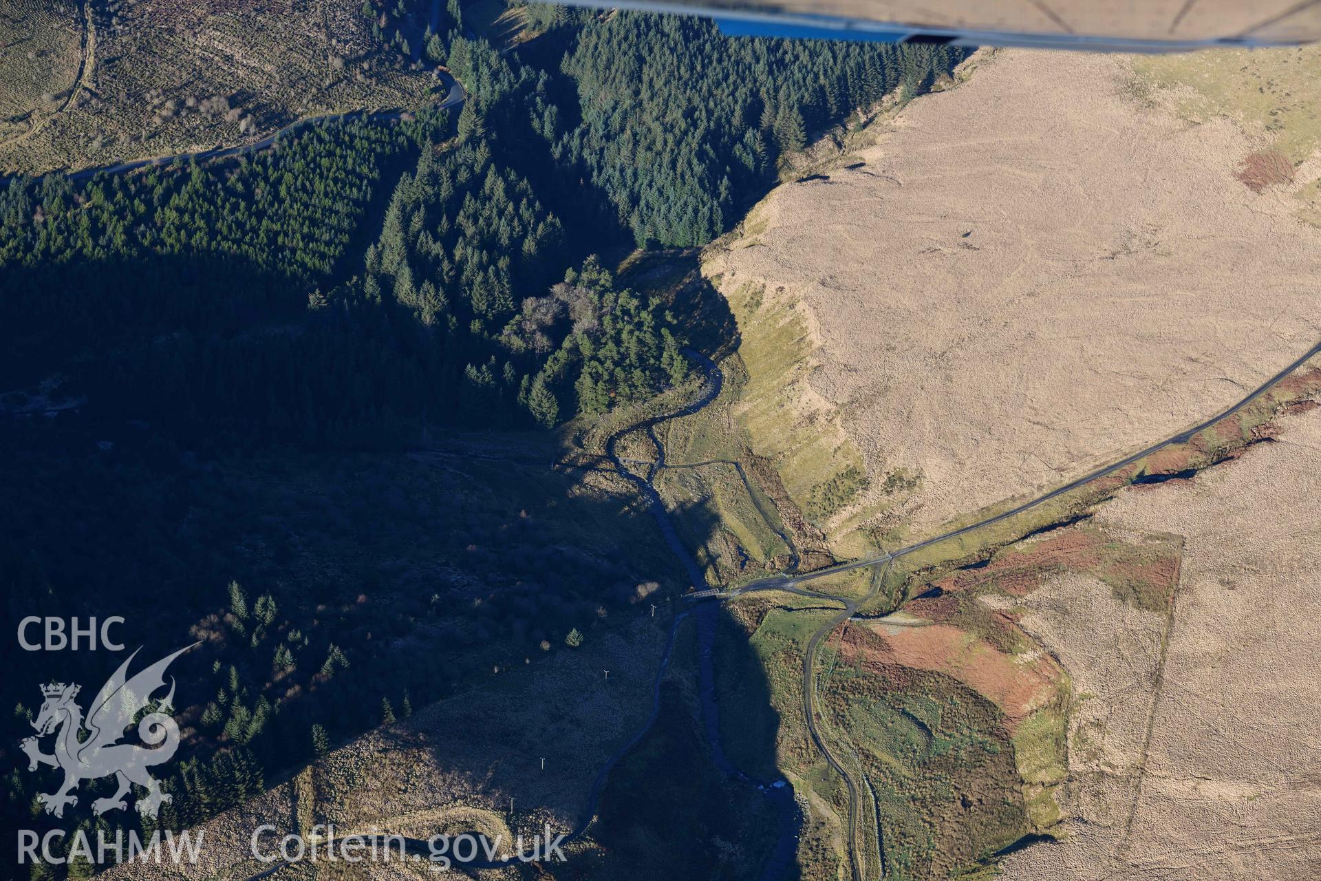 Oblique aerial photograph showing view from the north east of Nant Dilw Fechan deserted rural settlement taken during the Royal Commission’s programme of archaeological aerial reconnaissance by Toby Driver on 17th January 2022