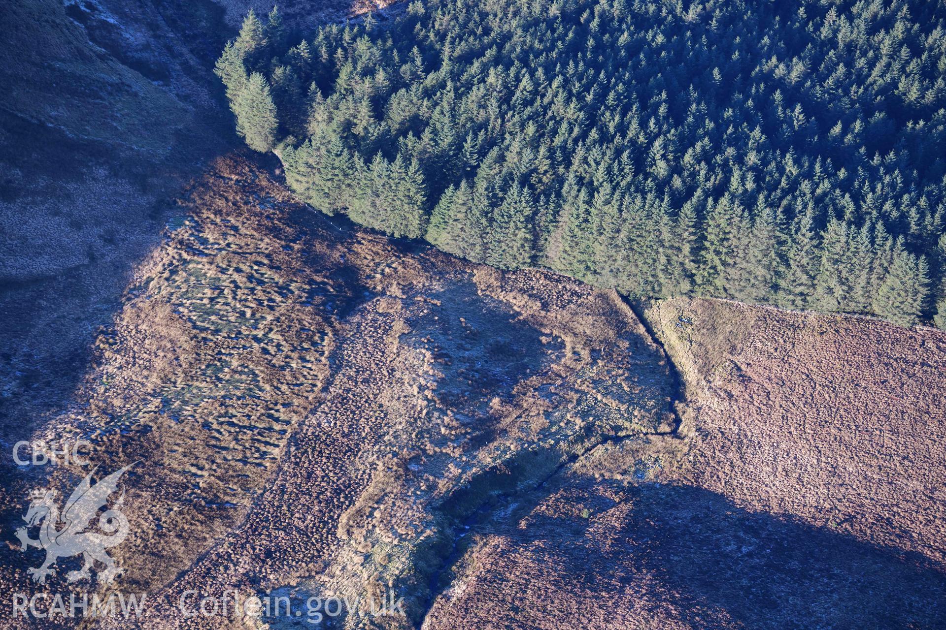 Oblique aerial photograph of Nant Yspryd deserted rural settlement taken during the Royal Commission’s programme of archaeological aerial reconnaissance by Toby Driver on 17th January 2022