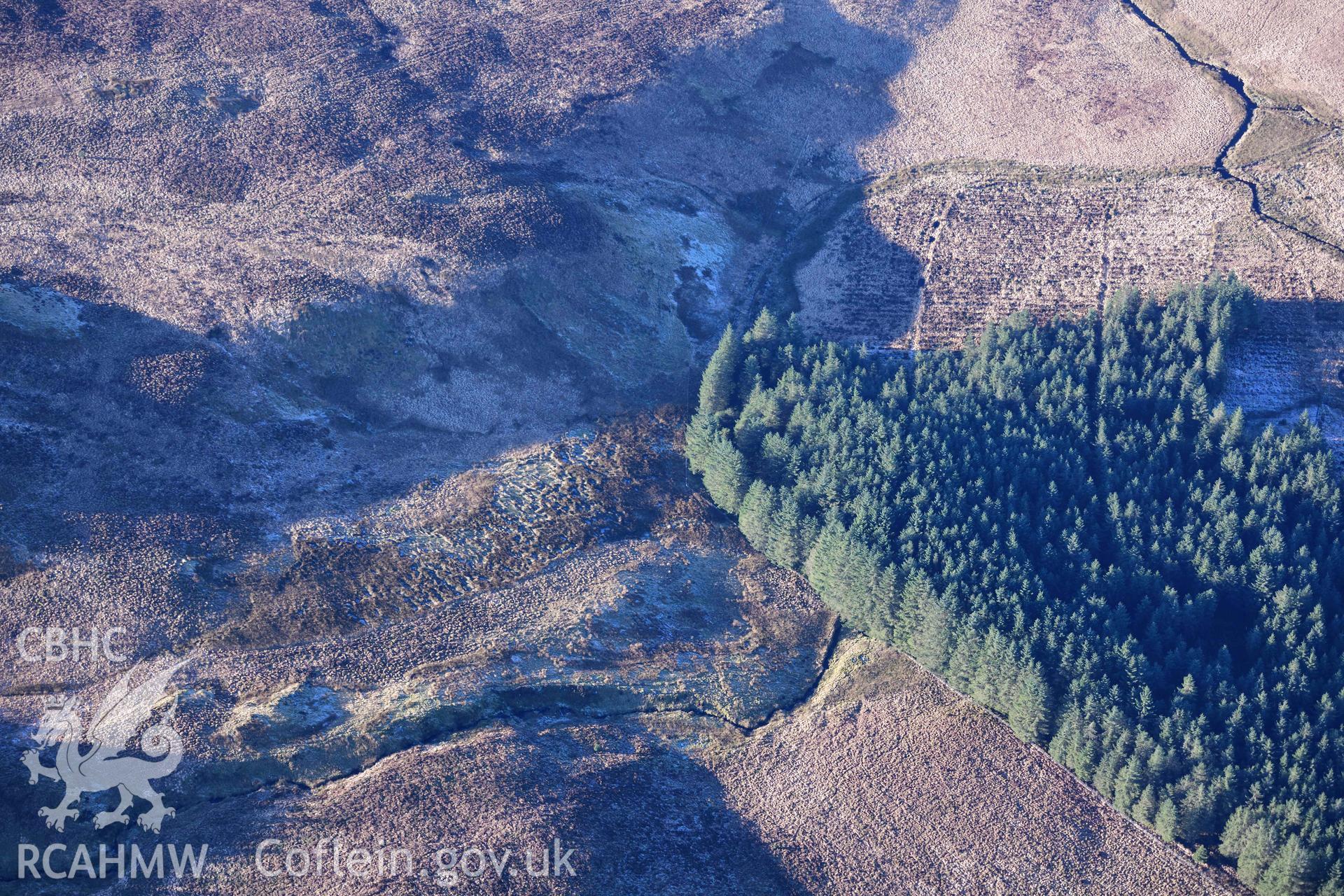 Oblique aerial photograph of Nant Yspryd deserted rural settlement taken during the Royal Commission’s programme of archaeological aerial reconnaissance by Toby Driver on 17th January 2022