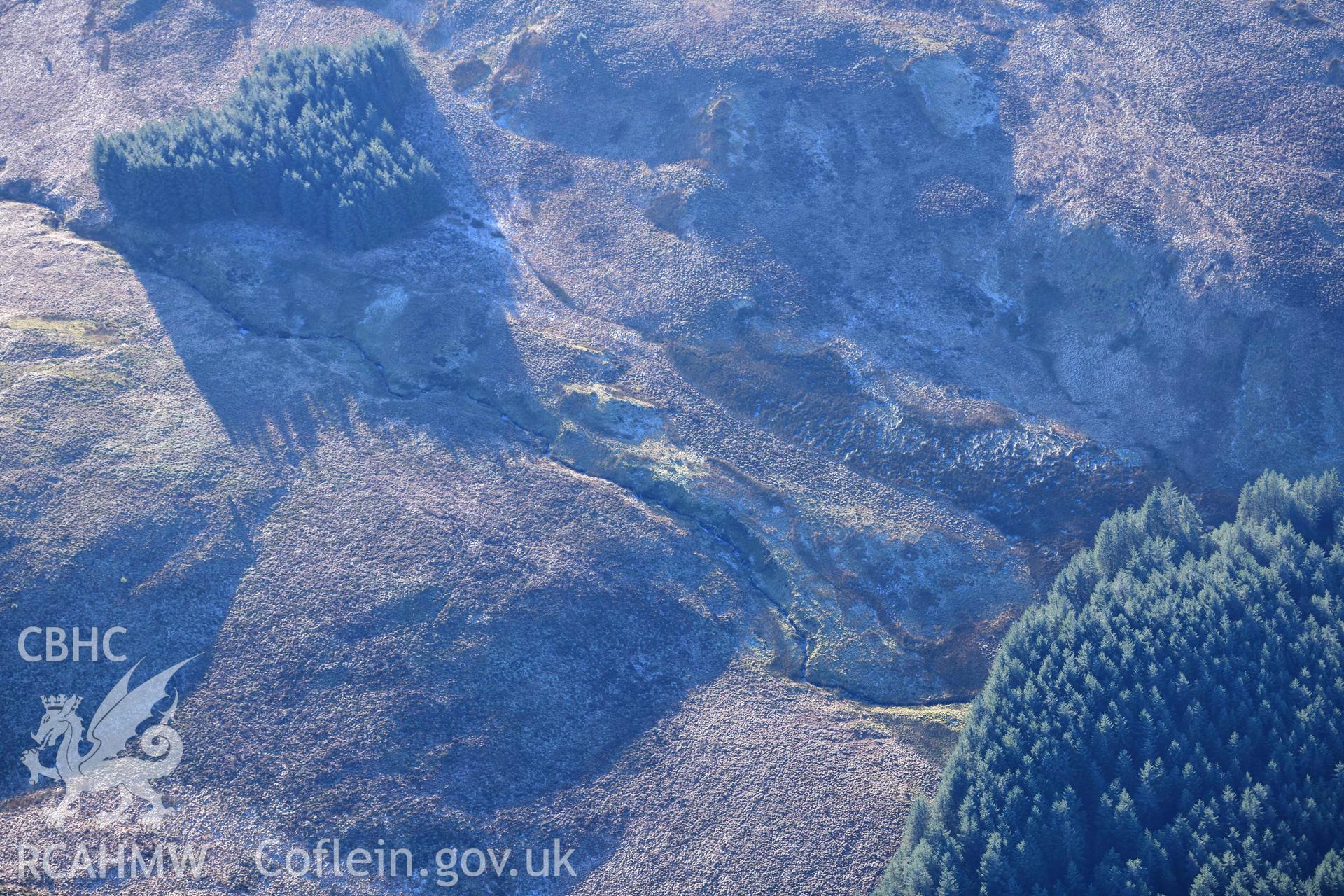 Oblique aerial photograph of Nant Yspryd deserted rural settlement taken during the Royal Commission’s programme of archaeological aerial reconnaissance by Toby Driver on 17th January 2022