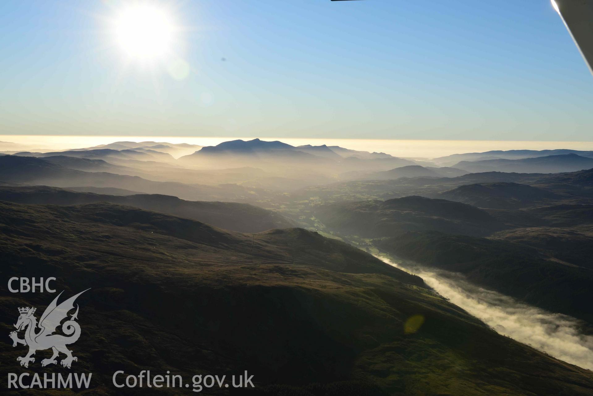 Oblique aerial photograph of Cader Idris winter landscape taken from the north east during the Royal Commission’s programme of archaeological aerial reconnaissance by Toby Driver on 17th January 2022