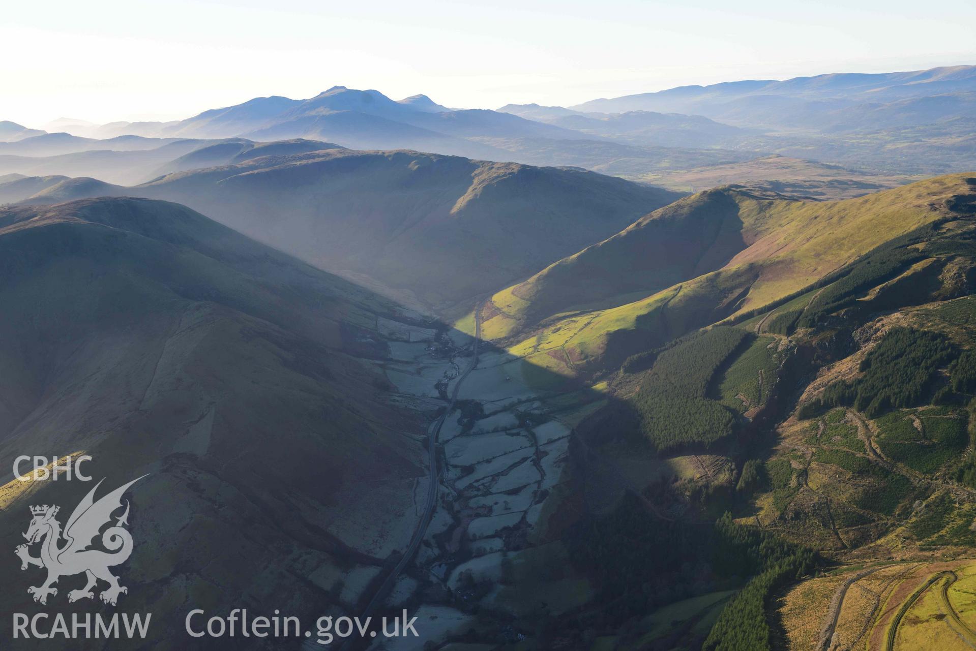 Oblique aerial photograph of Cader Idris winter landscape taken from the east at Cwm Cerist (SH8316) during the Royal Commission’s programme of archaeological aerial reconnaissance by Toby Driver on 17th January 2022