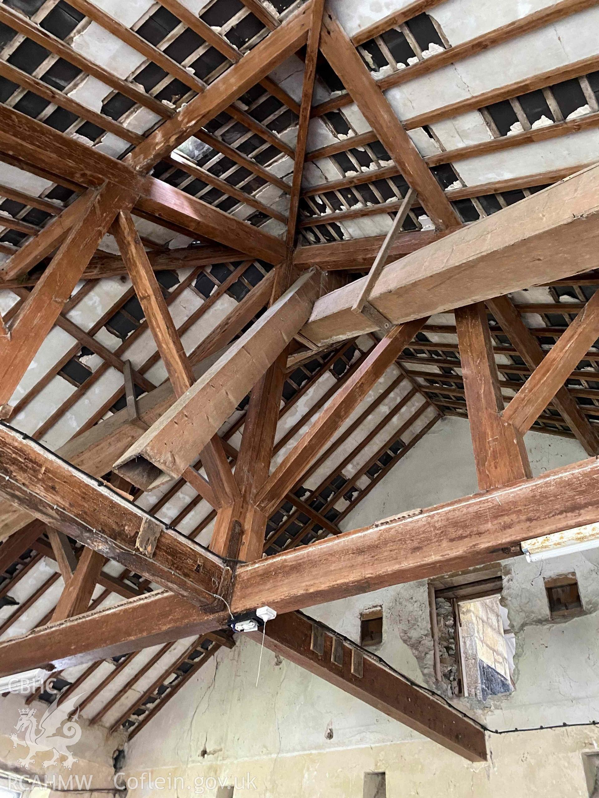 Digital photo showing interior roof timbers of existing house garage at Parciau, Marianglas, produced in March 2023 as part of planning conditions for Isle of Anglesey County Council, reference: FPL/2022/330.