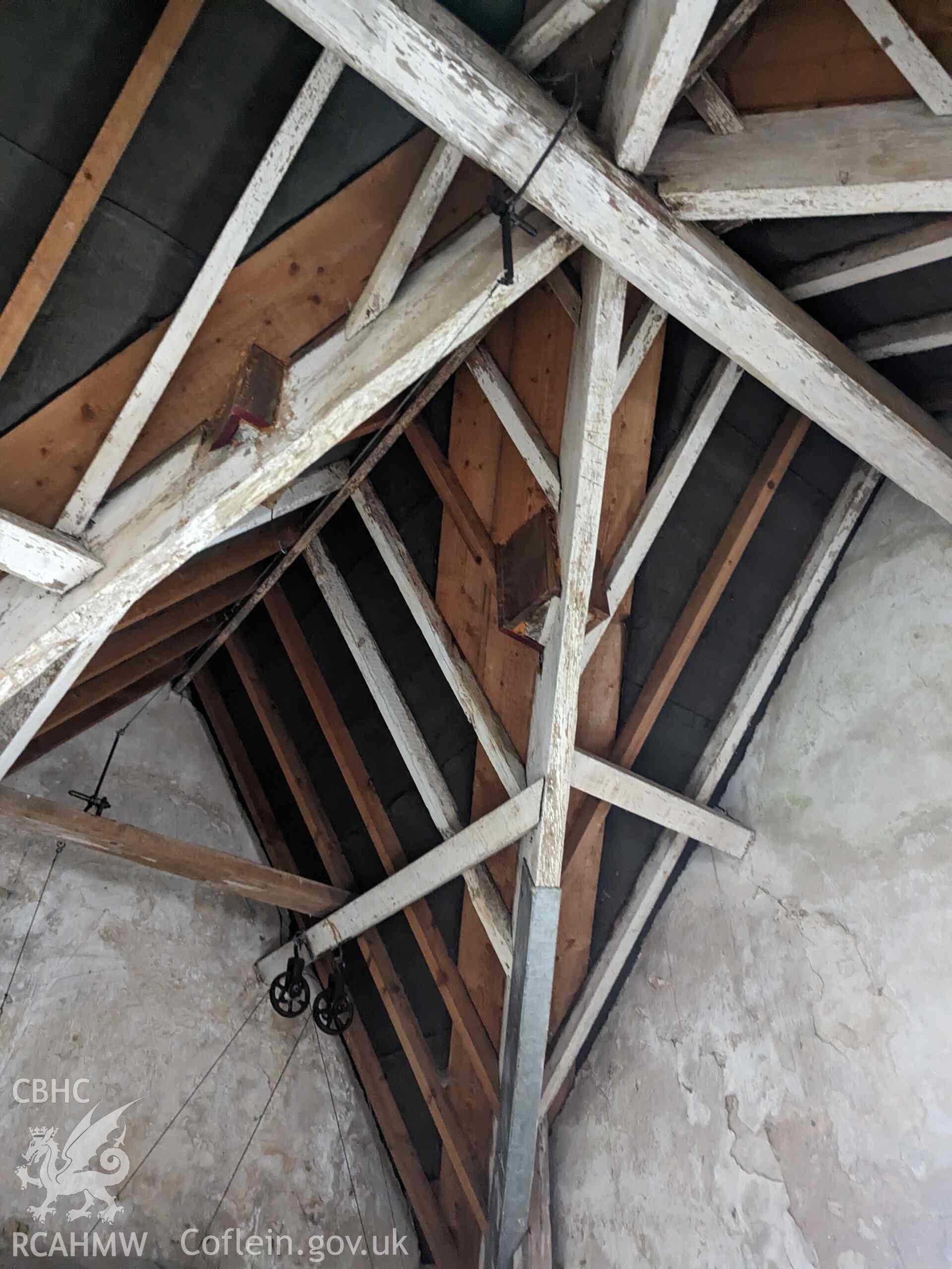 Digital photo showing interior roof timbers of clock house at Parciau, Marianglas, produced in March 2023 as part of planning conditions for Isle of Anglesey County Council, reference: FPL/2022/330.