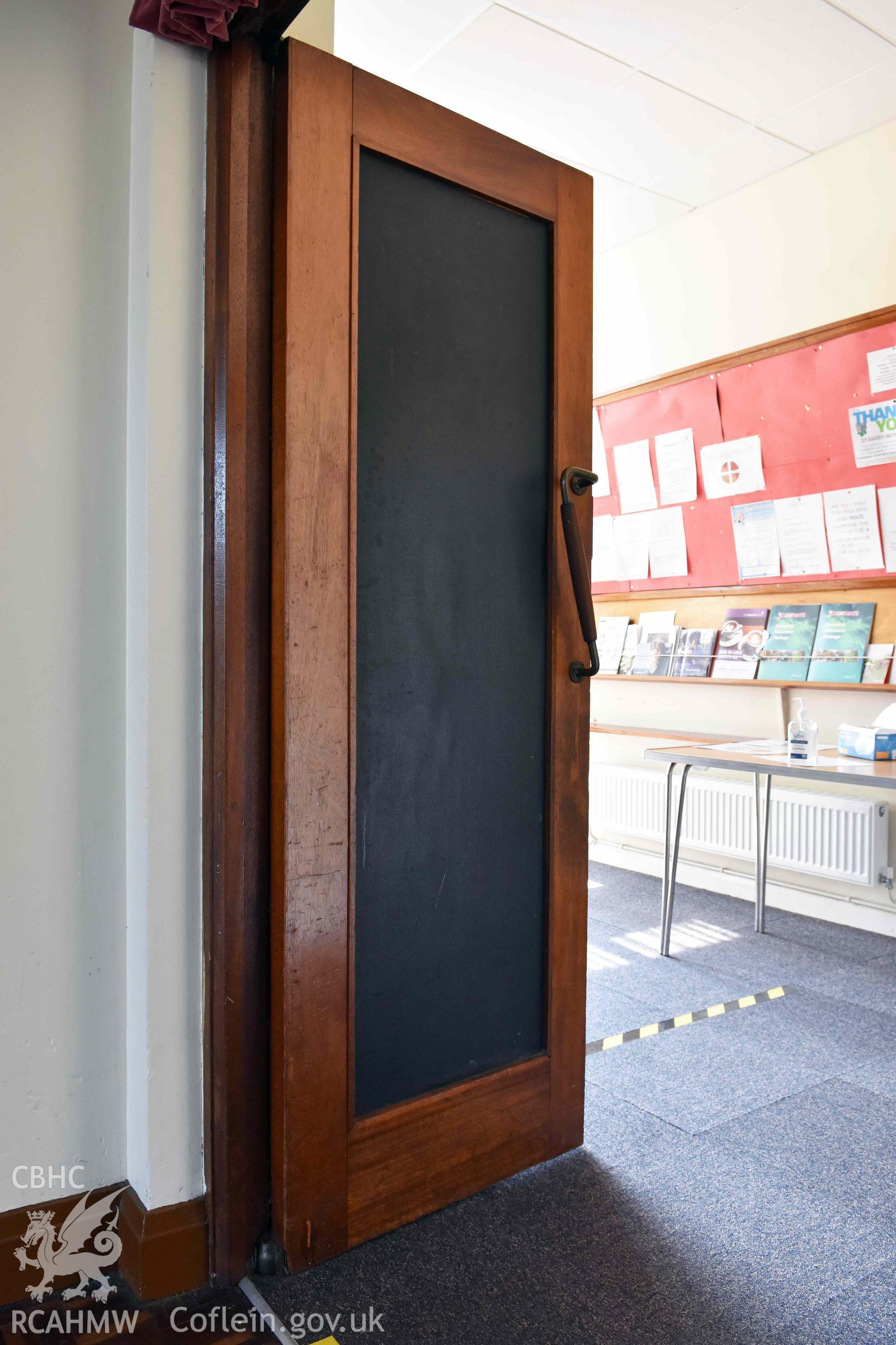 Door from main auditorium to foyer - part of a photographic survey of St David's Methodist Chapel, Barry, carried out in July 2021.