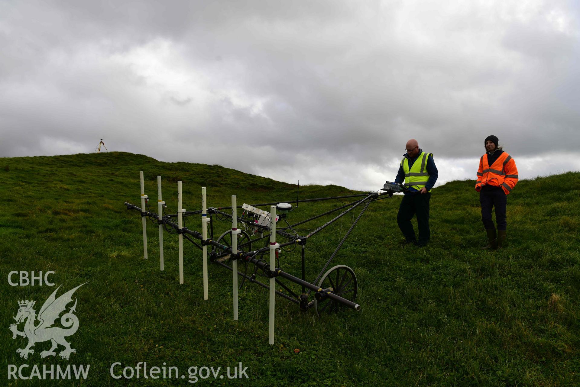 Photograph of survey in progress to south-west of hillfort. Taken by Toby Driver of RCAHMW on 20 October 2020 during Geophysical Survey of Darren Camp Hillfort, Ceredigion. Commissioned by the RCAHMW and produced by Wessex Archaeology, October - December 2020.