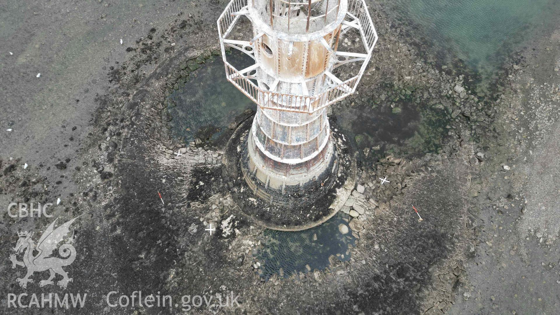 Whitford Point Lighthouse. General overhead view of plinth and associated scour, seen from the south-west side on 17/08/2023.