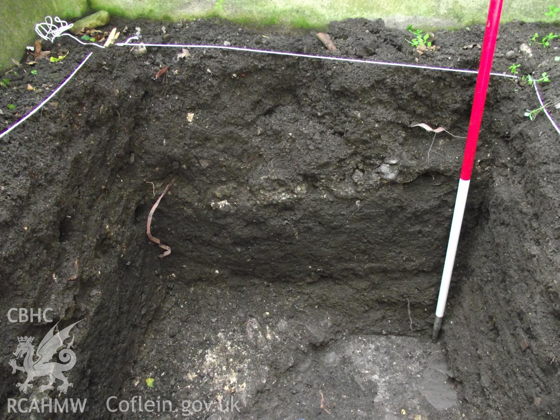 Digital photograph showing excavated area at 1A White Hart Lane and 30 High Street (Bank House), Caerleon. Produced by M. Lewis, National Roman Legion Museum. August 2012.