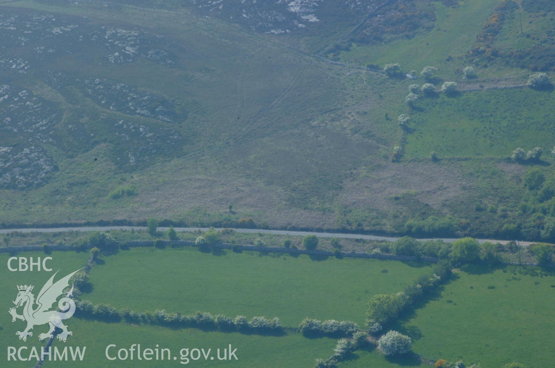 RCAHMW colour oblique aerial photograph of Bodafon Mountain Settlement Features I. Taken on 26 May 2004 by Toby Driver