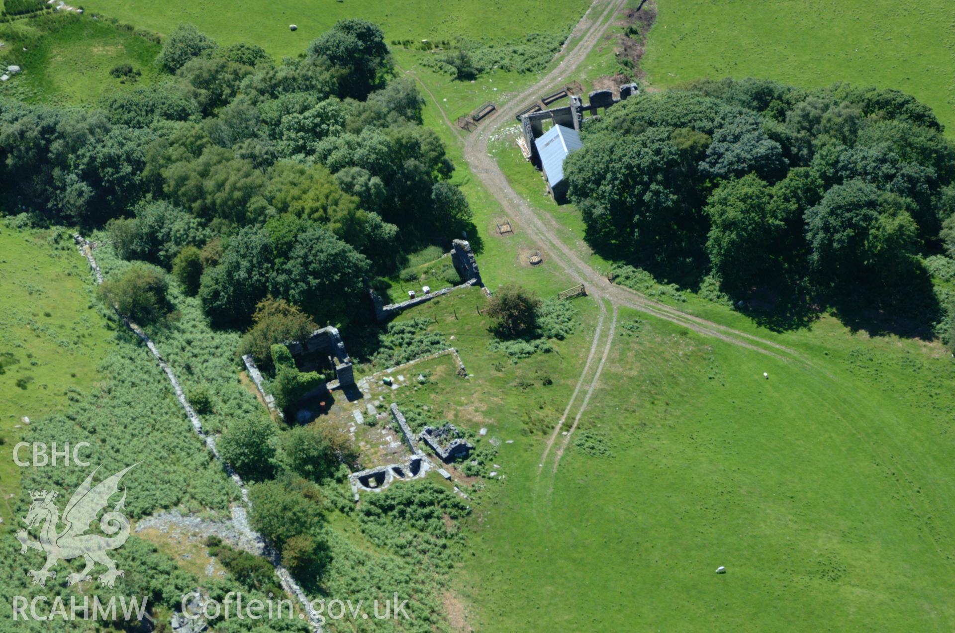 RCAHMW colour oblique aerial photograph of the mine office at Bryndyfi Lead Mine taken on 14/06/2004 by Toby Driver