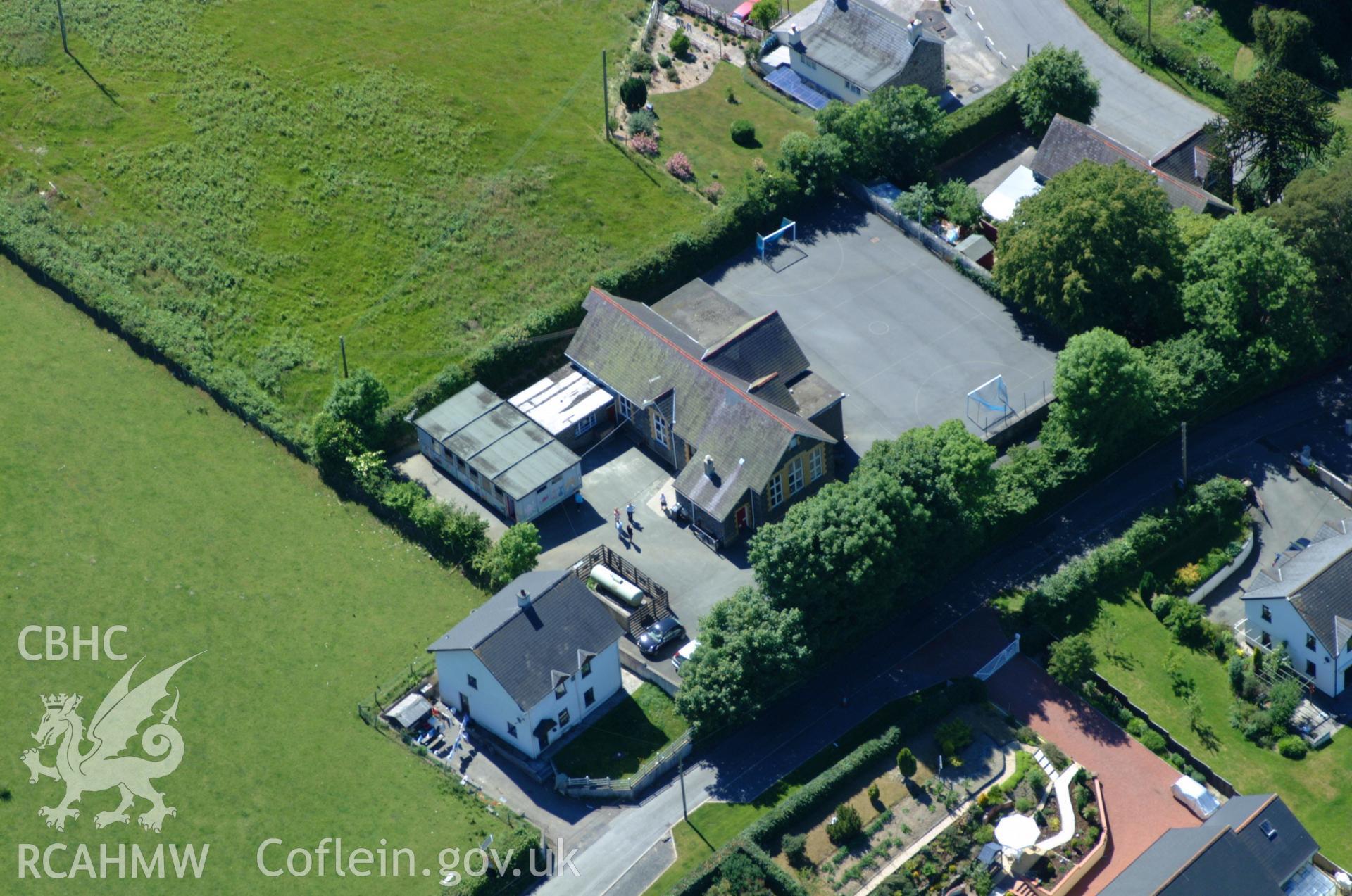 RCAHMW colour oblique aerial photograph of the village of  Llangwyryfon taken on 14/06/2004 by Toby Driver