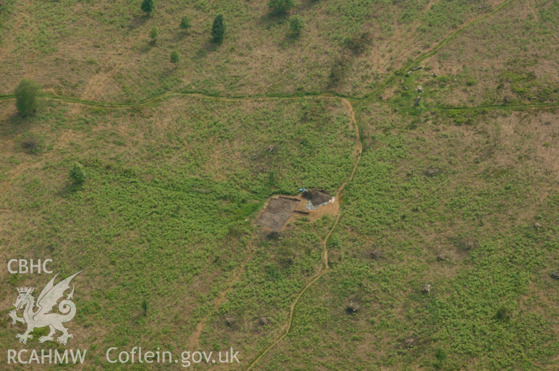 RCAHMW colour oblique aerial photograph of the Grey Hill field system showing excavations by the University of Wales, Newport. Taken on 26 May 2004 by Toby Driver