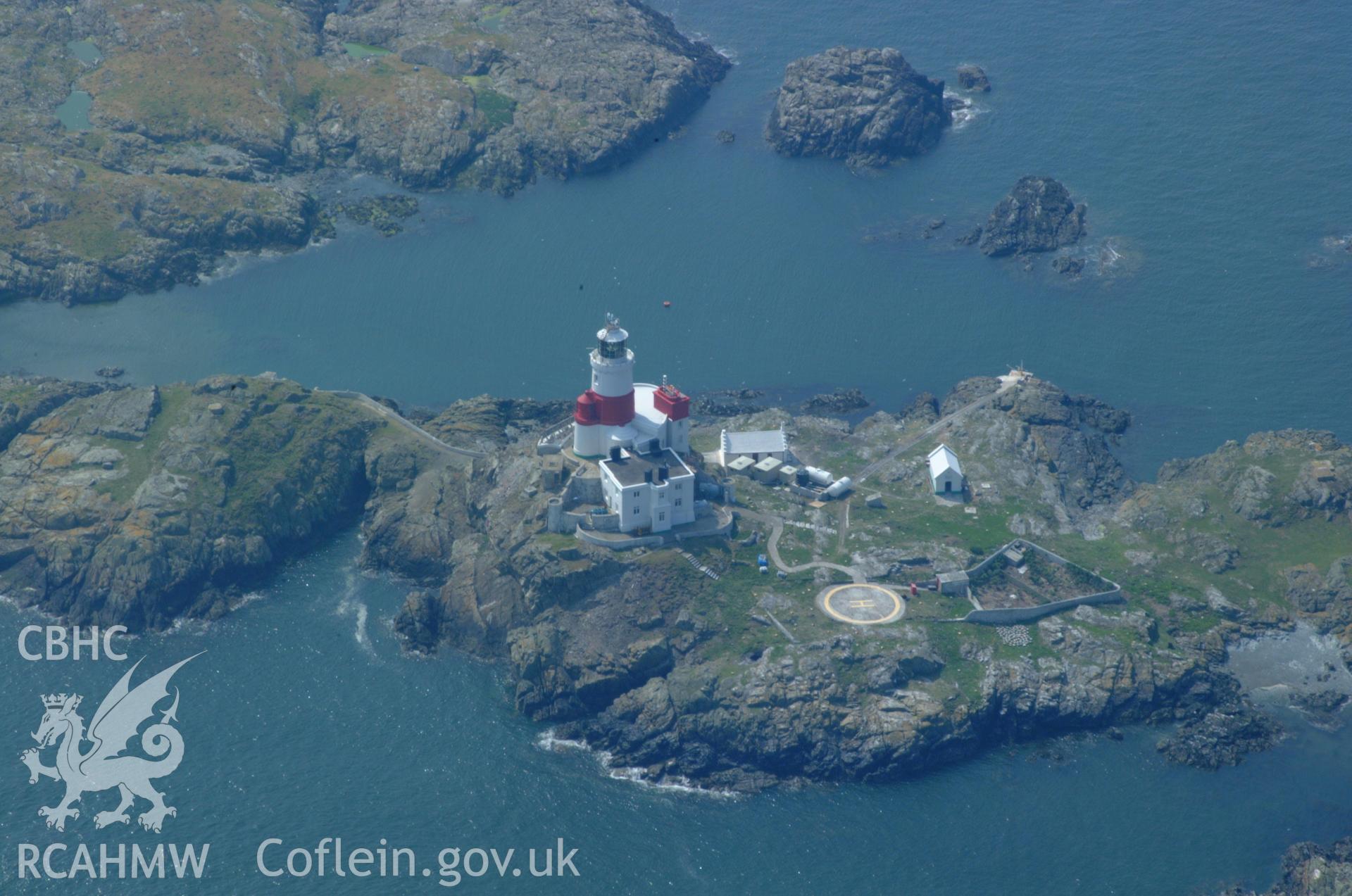 RCAHMW colour oblique aerial photograph of the Skerries Lighthouse taken on 26/05/2004 by Toby Driver