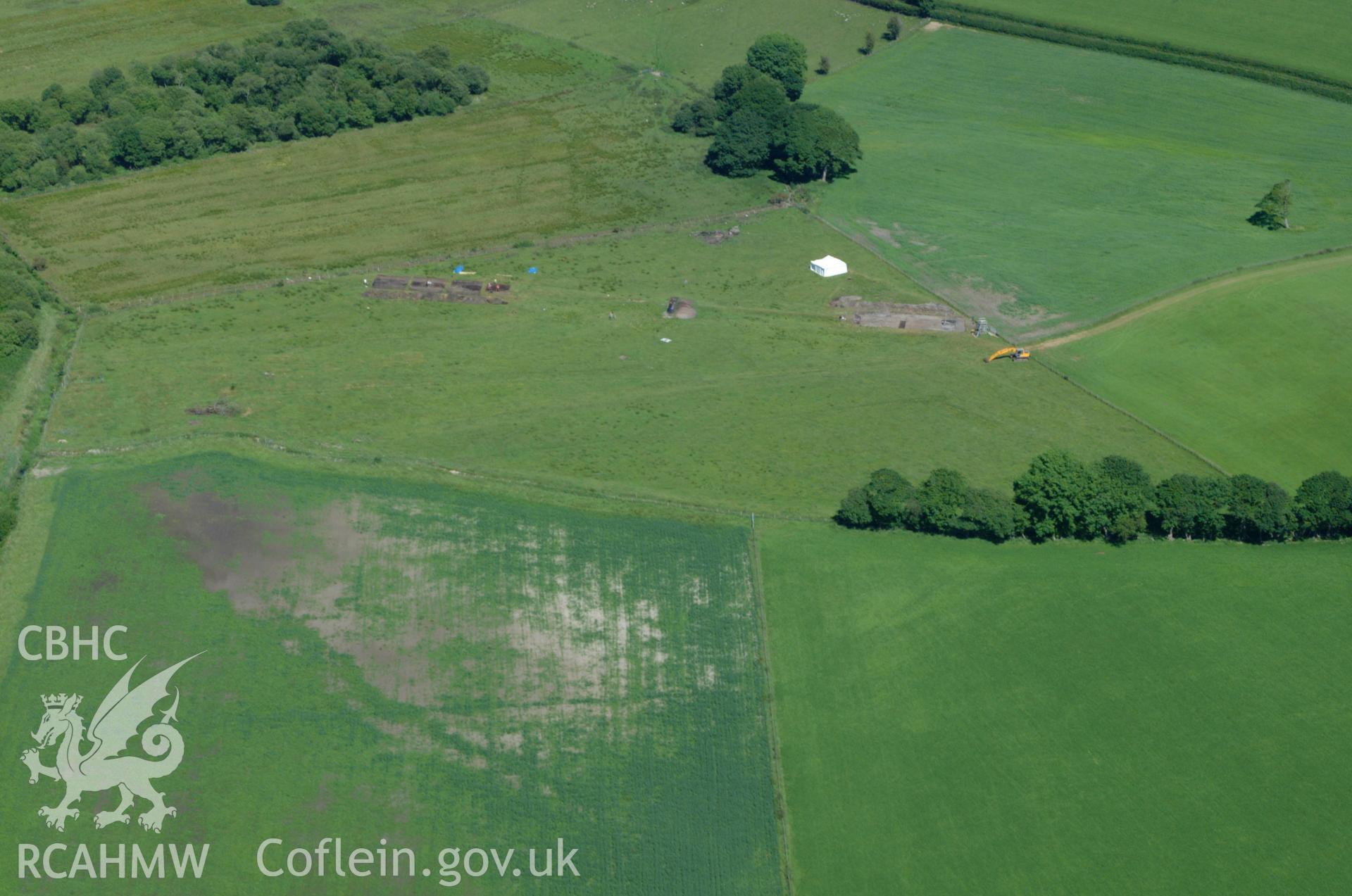 RCAHMW colour oblique aerial photograph of Llangynfelin Timber Trackway taken on 14/06/2004 by Toby Driver