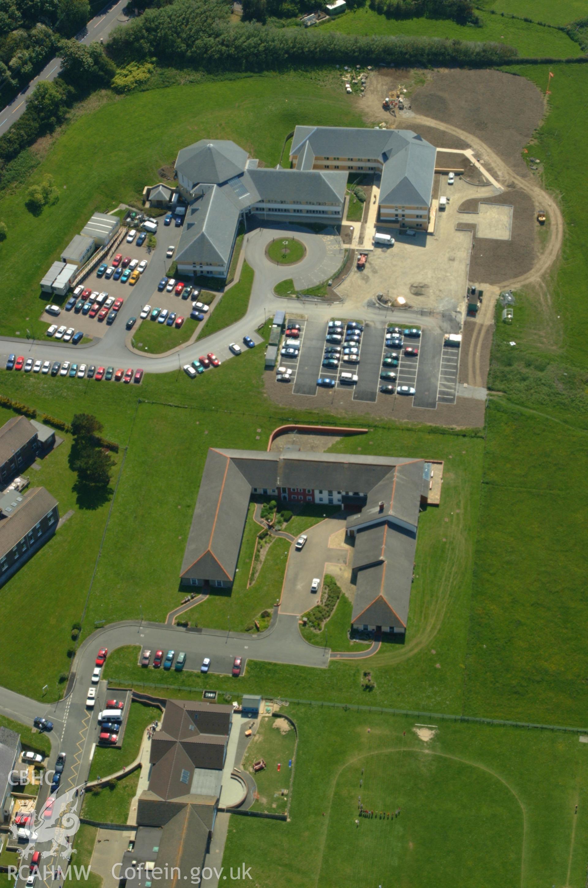 RCAHMW colour oblique aerial photograph of Penmorfa Council Buildings, Aberaeron. Taken on 24 May 2004 by Toby Driver