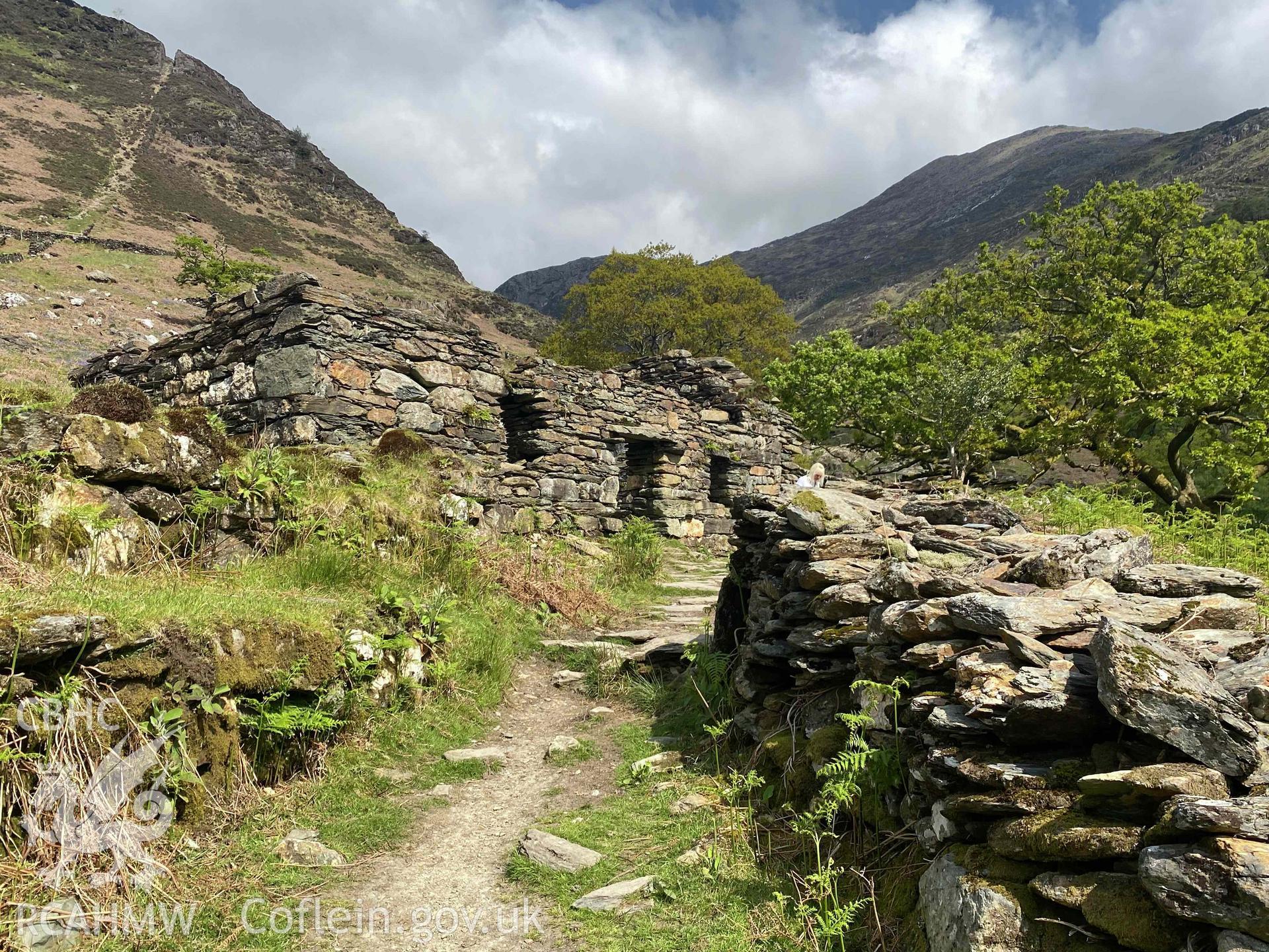 Digital photograph showing front elevation and path to Hafod-y-Llan Uchaf, produced by Paul Davis in 2023