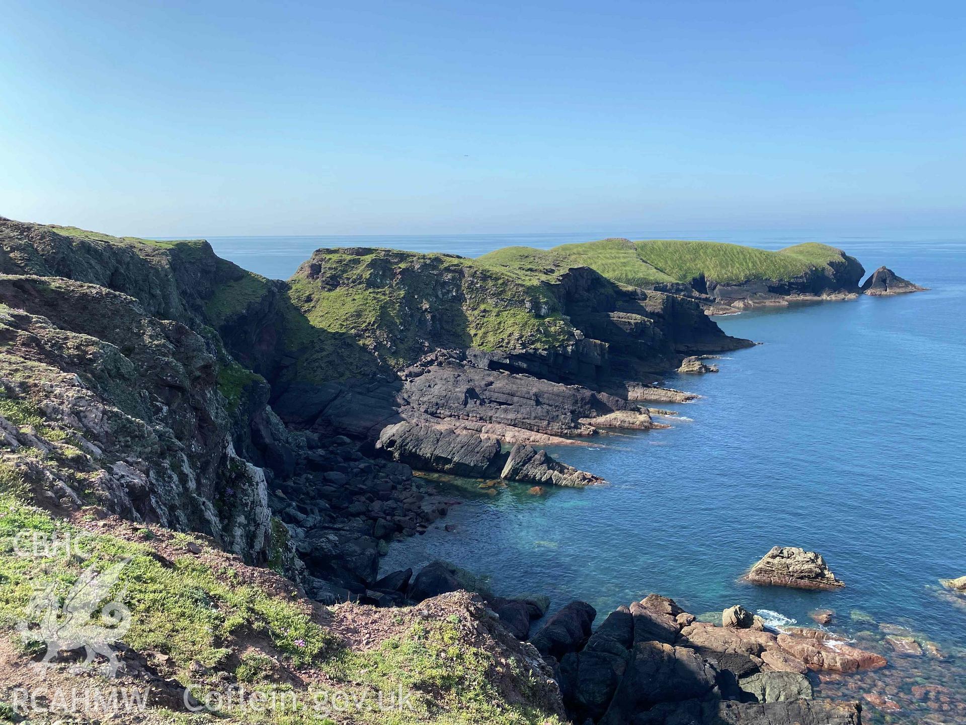 Digital photograph showing general view from the east of Promontory Fort at Sheep Island, produced by Paul Davis in 2023