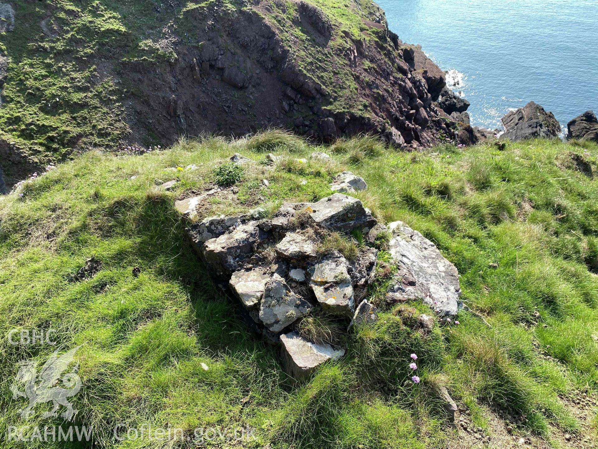 Digital photograph showing tower remains of Promontory Fort at Sheep Island, produced by Paul Davis in 2023