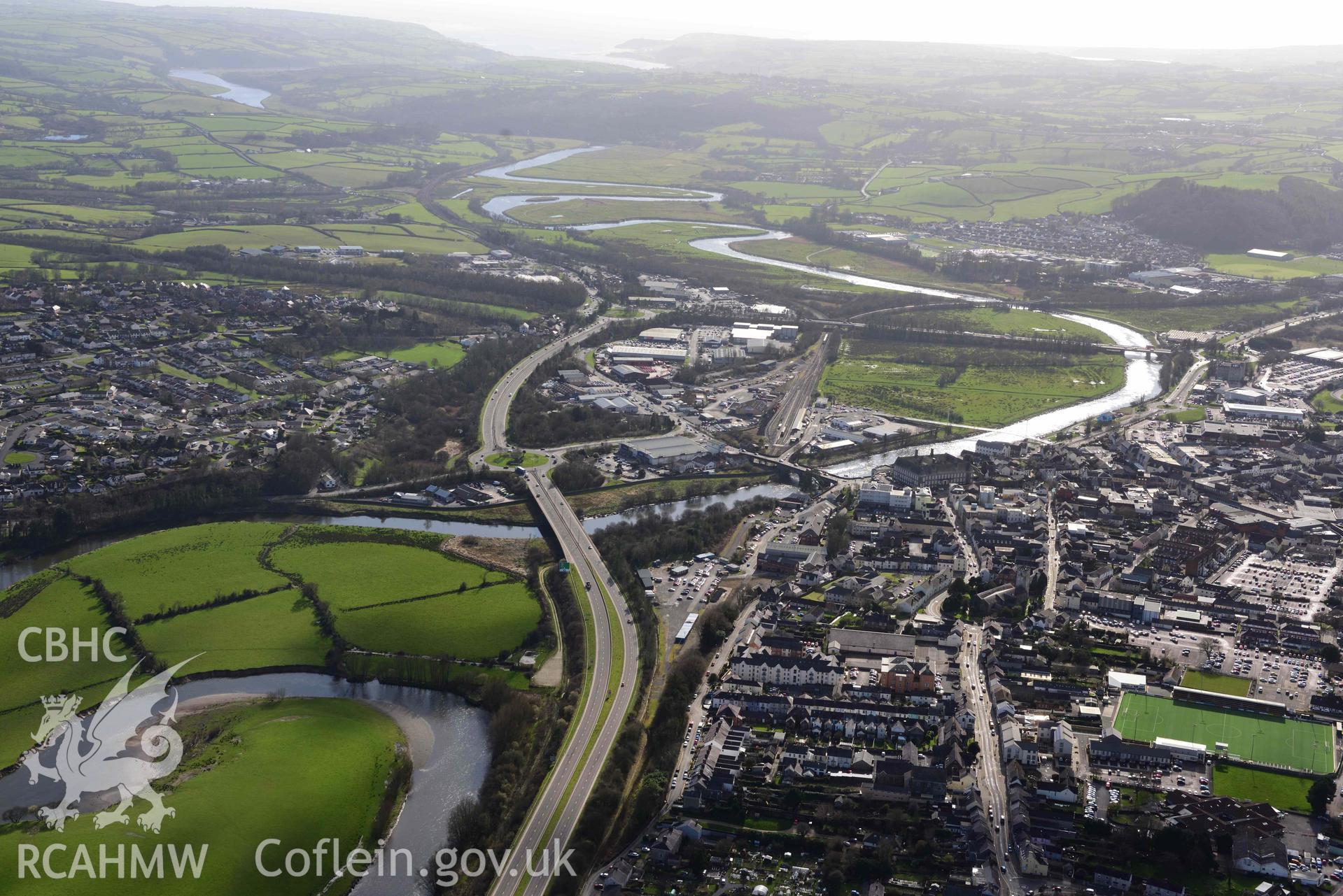 Carmarthen town, from northeast. Oblique aerial photograph taken during the Royal Commission’s programme of archaeological aerial reconnaissance by Toby Driver on 14 March 2022.