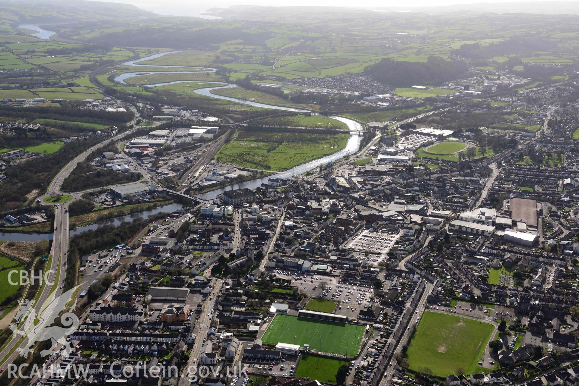 Carmarthen town, from northeast. Oblique aerial photograph taken during the Royal Commission’s programme of archaeological aerial reconnaissance by Toby Driver on 14 March 2022.