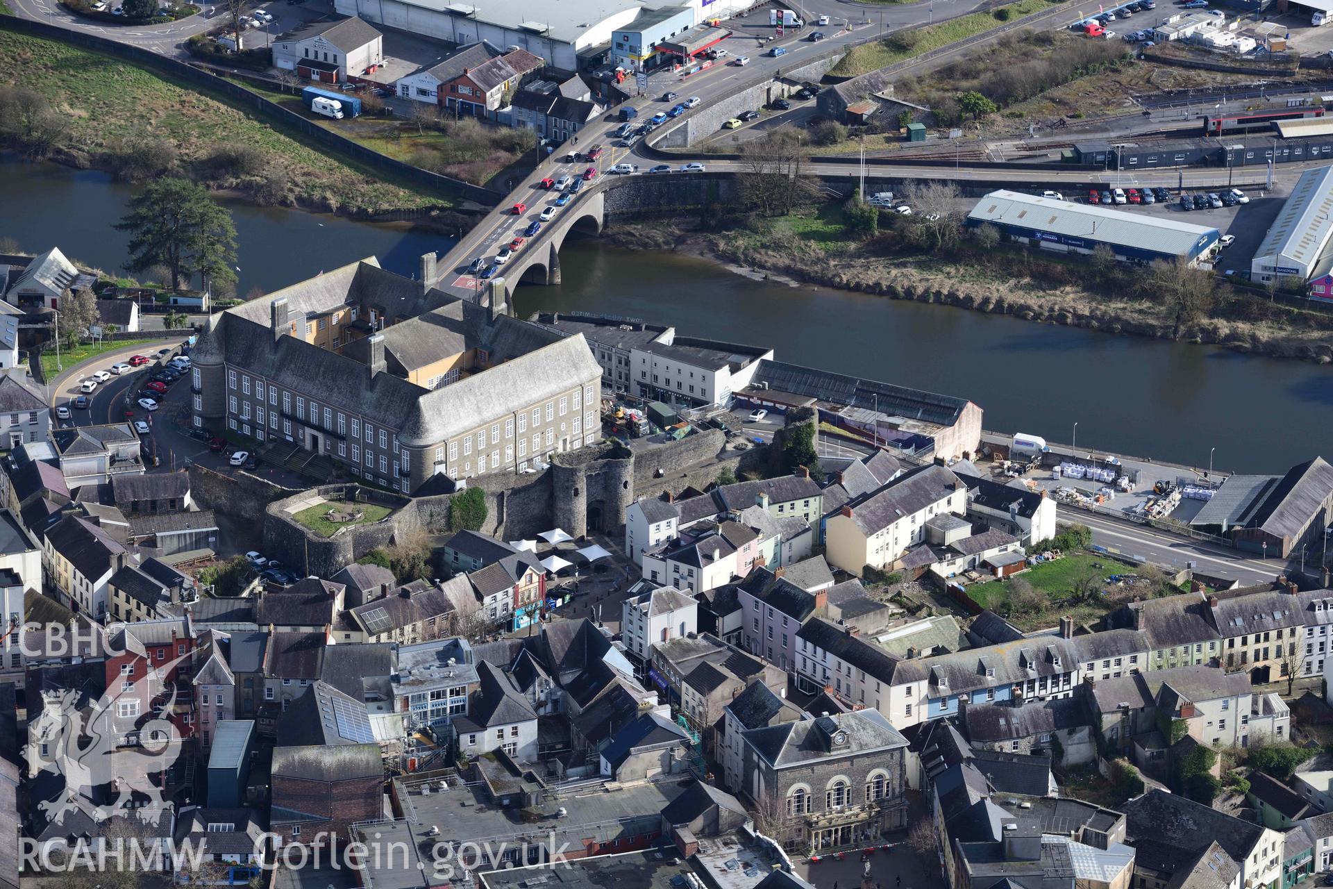 Carmarthen County Hall and Carmarthen Castle. Oblique aerial photograph taken during the Royal Commission’s programme of archaeological aerial reconnaissance by Toby Driver on 14 March 2022.