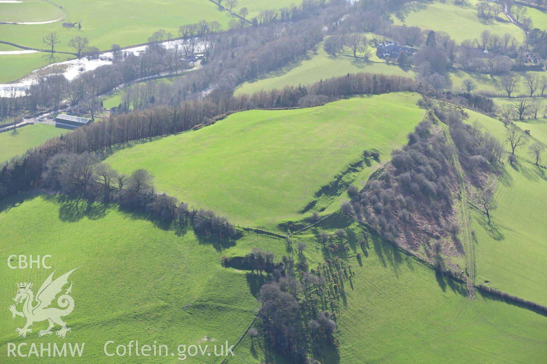 Merlin's Hill hillfort, wide view from the east. Oblique aerial photograph taken during the Royal Commission’s programme of archaeological aerial reconnaissance by Toby Driver on 14 March 2022.