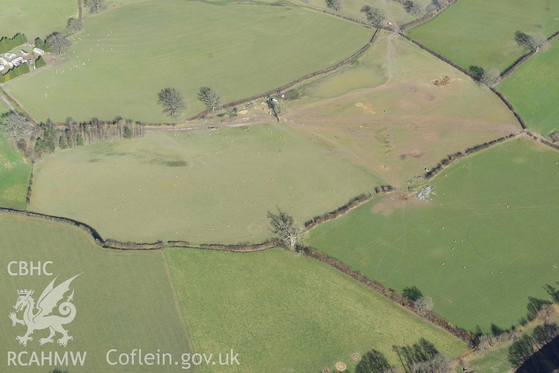 Penmincae Roman fortlet. Oblique aerial photograph taken during the Royal Commission’s programme of archaeological aerial reconnaissance by Toby Driver on 14 March 2022.