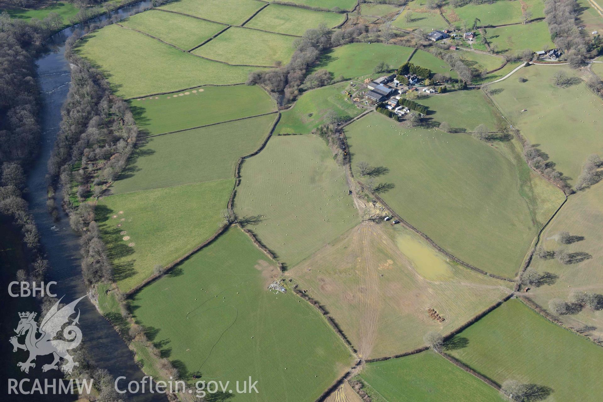 Penmincae Roman fortlet. Oblique aerial photograph taken during the Royal Commission’s programme of archaeological aerial reconnaissance by Toby Driver on 14 March 2022.