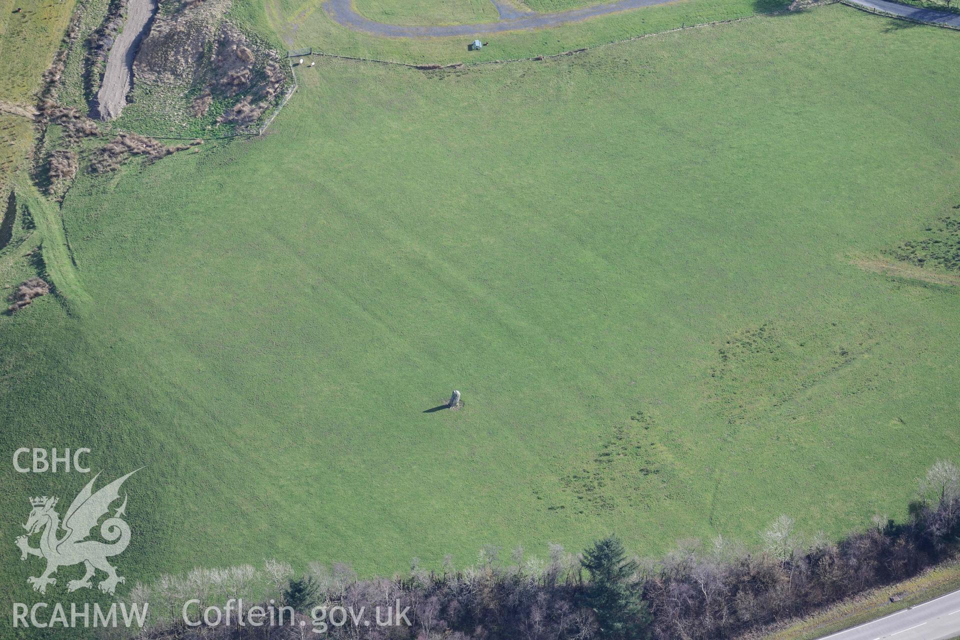 Caer Maen/Cambrian Factory standing stone. Oblique aerial photograph taken during the Royal Commission’s programme of archaeological aerial reconnaissance by Toby Driver on 14 March 2022.