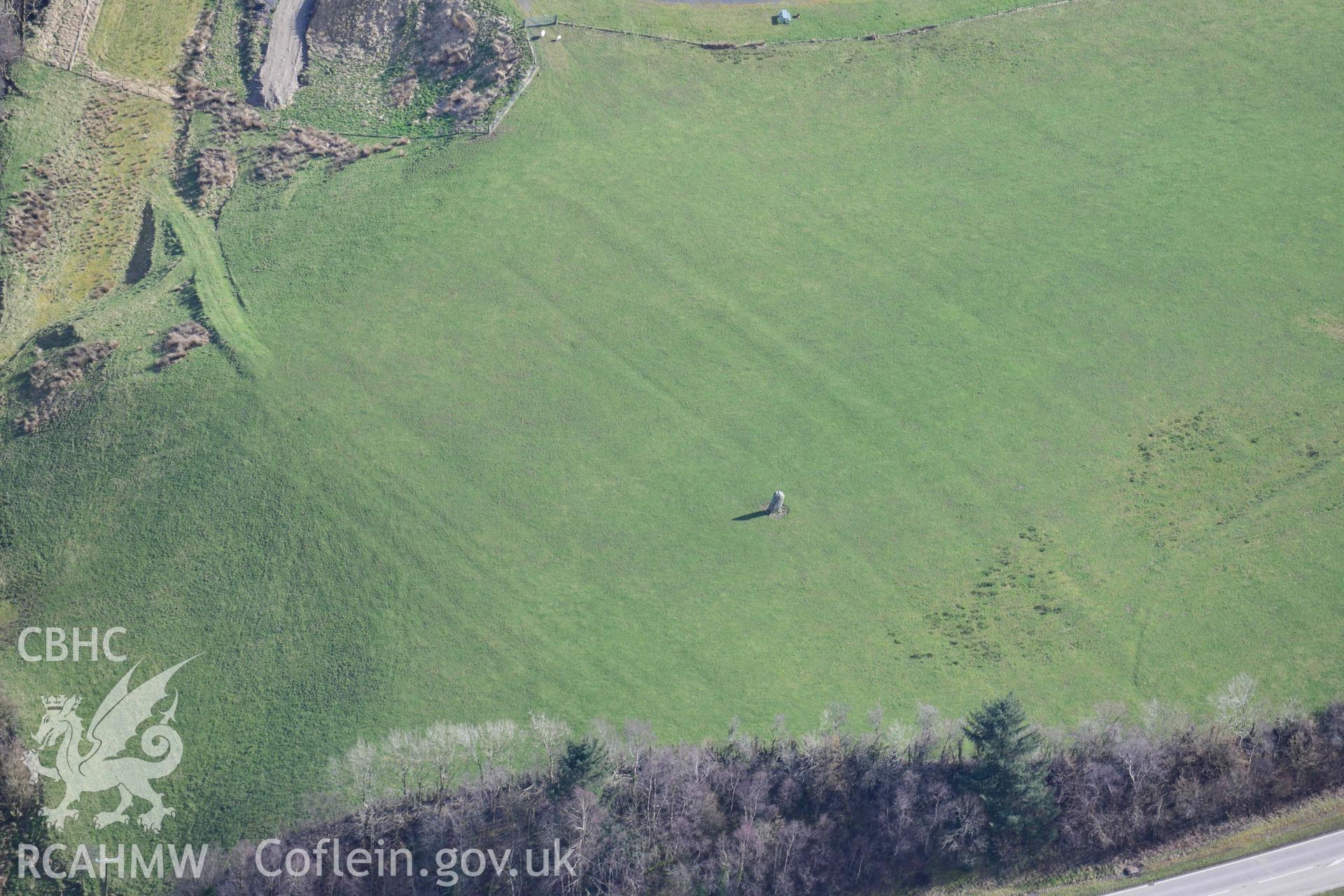 Caer Maen/Cambrian Factory standing stone. Oblique aerial photograph taken during the Royal Commission’s programme of archaeological aerial reconnaissance by Toby Driver on 14 March 2022.