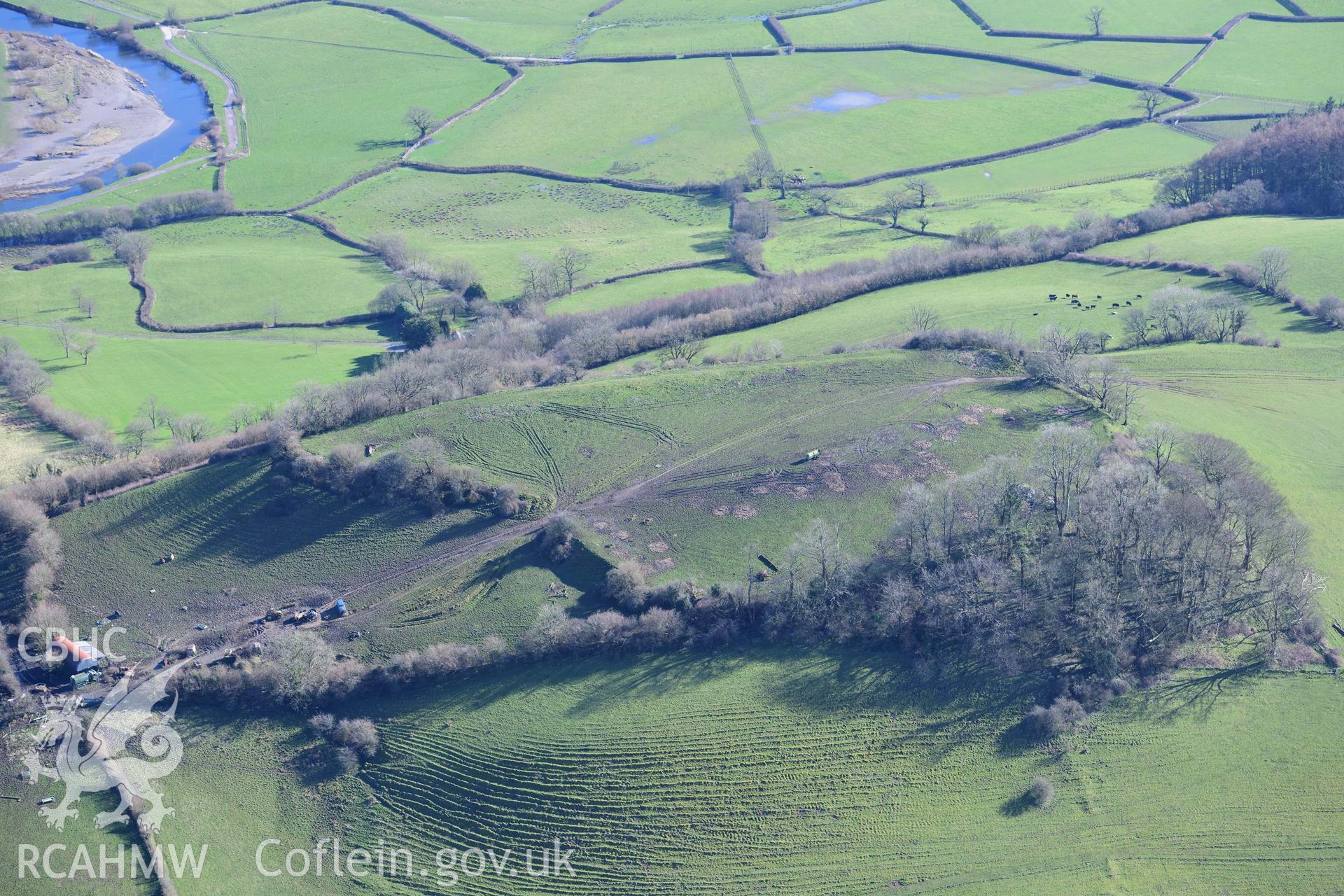 Grongaer hillfort. Oblique aerial photograph taken during the Royal Commission’s programme of archaeological aerial reconnaissance by Toby Driver on 14 March 2022.