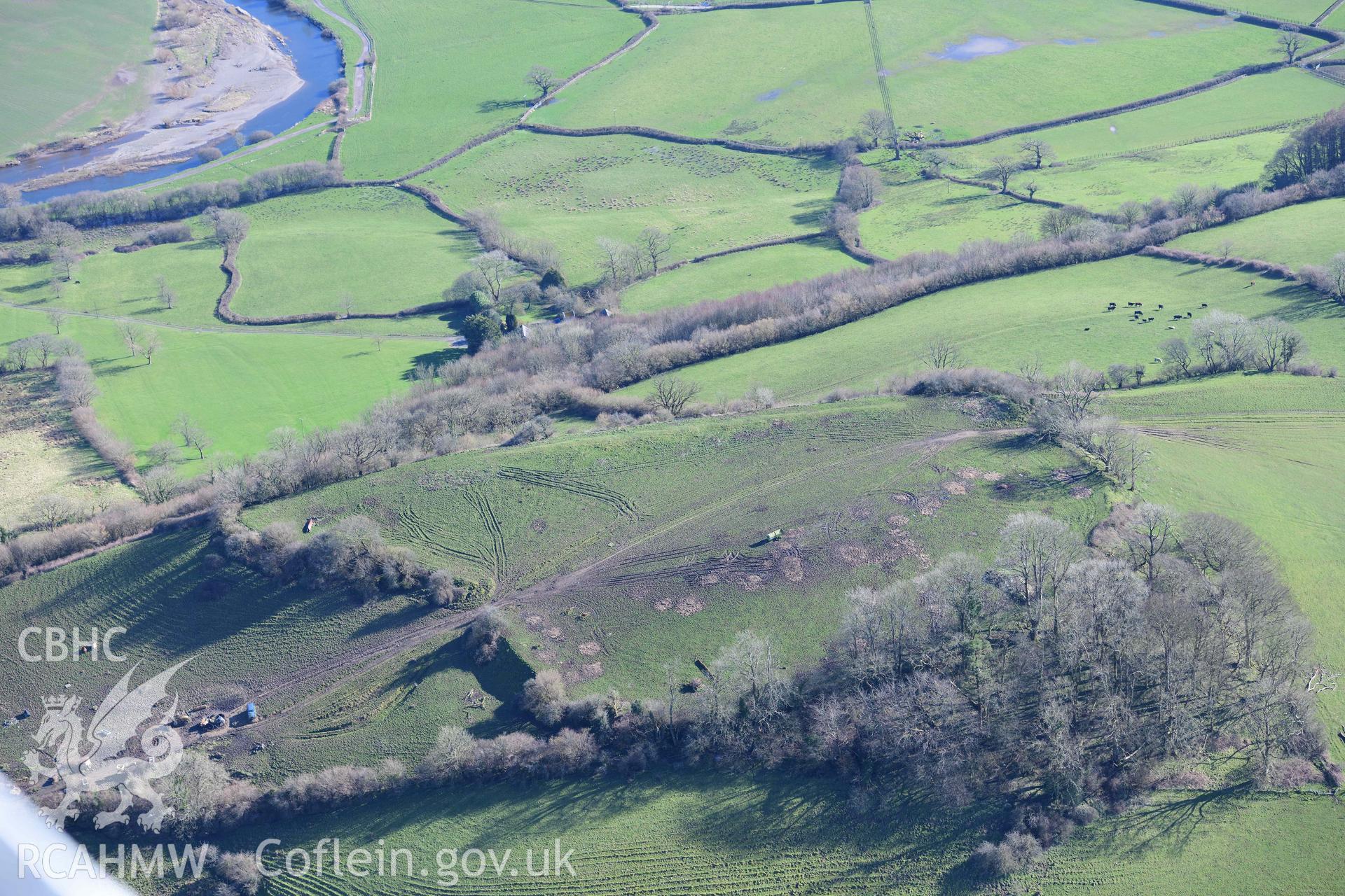 Grongaer hillfort. Oblique aerial photograph taken during the Royal Commission’s programme of archaeological aerial reconnaissance by Toby Driver on 14 March 2022.