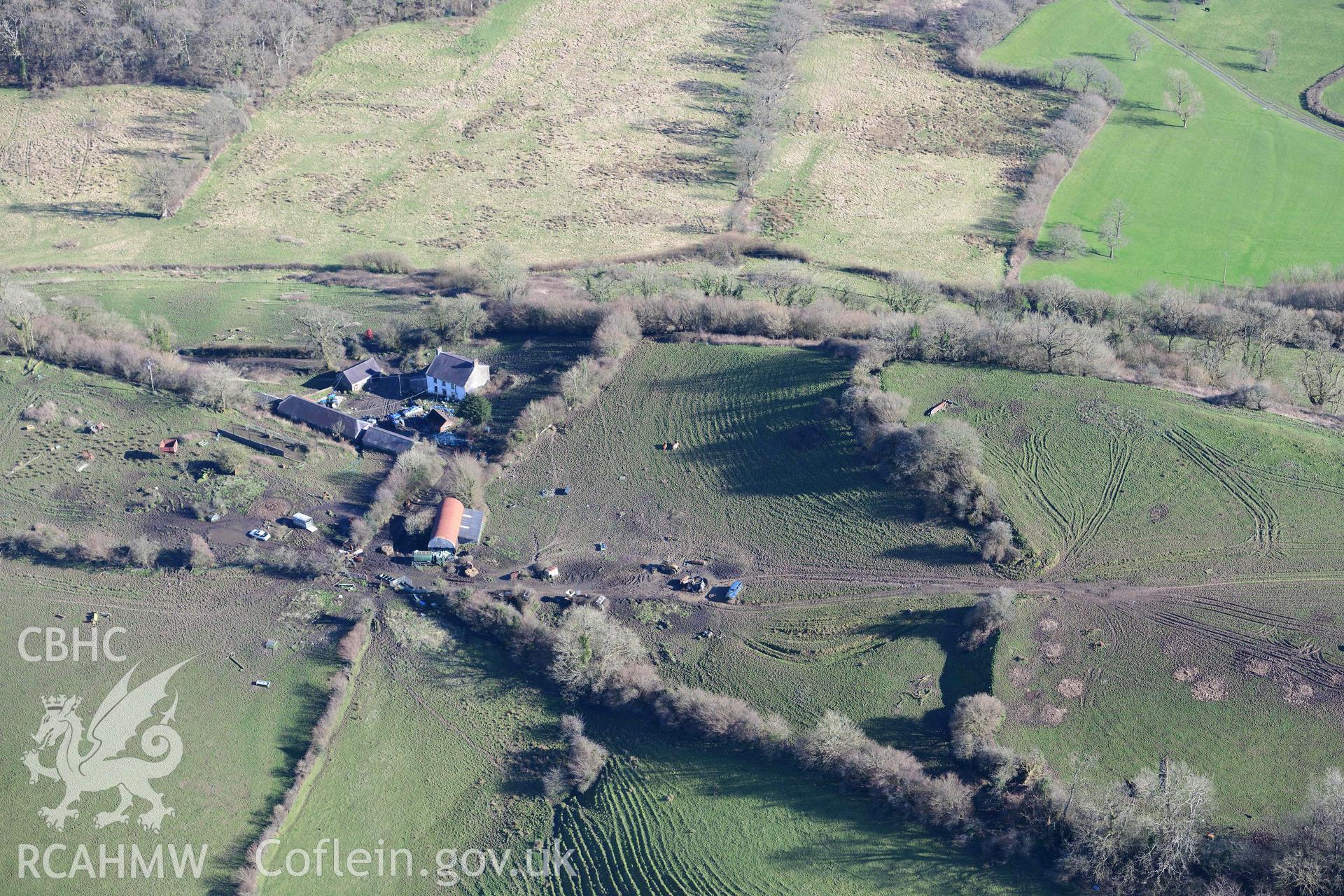 Grongaer hillfort. Oblique aerial photograph taken during the Royal Commission’s programme of archaeological aerial reconnaissance by Toby Driver on 14 March 2022.