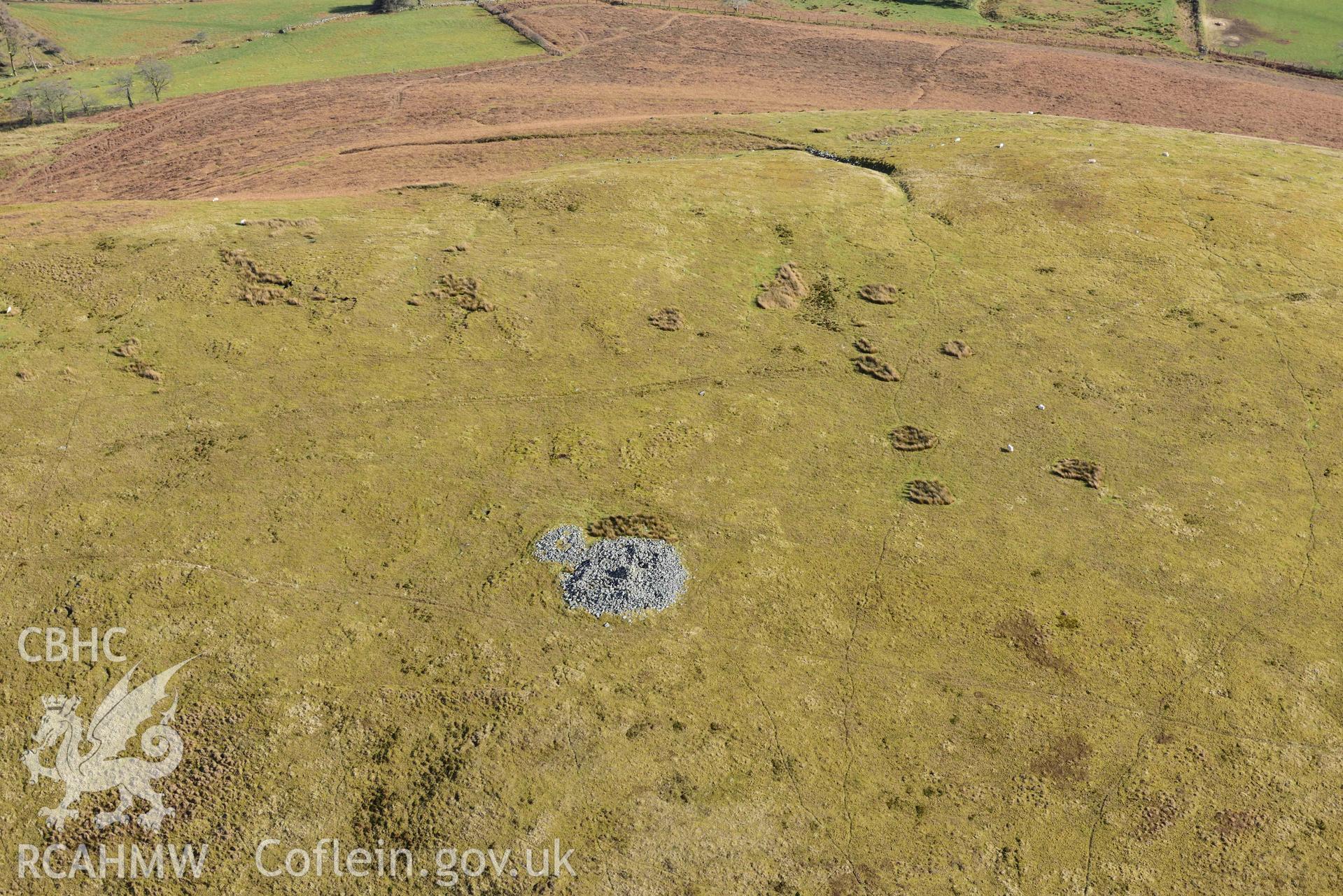 Y Gamriw or Graig Ddu, eastern cairn. Oblique aerial photograph taken during the Royal Commission’s programme of archaeological aerial reconnaissance by Toby Driver on 14 March 2022.