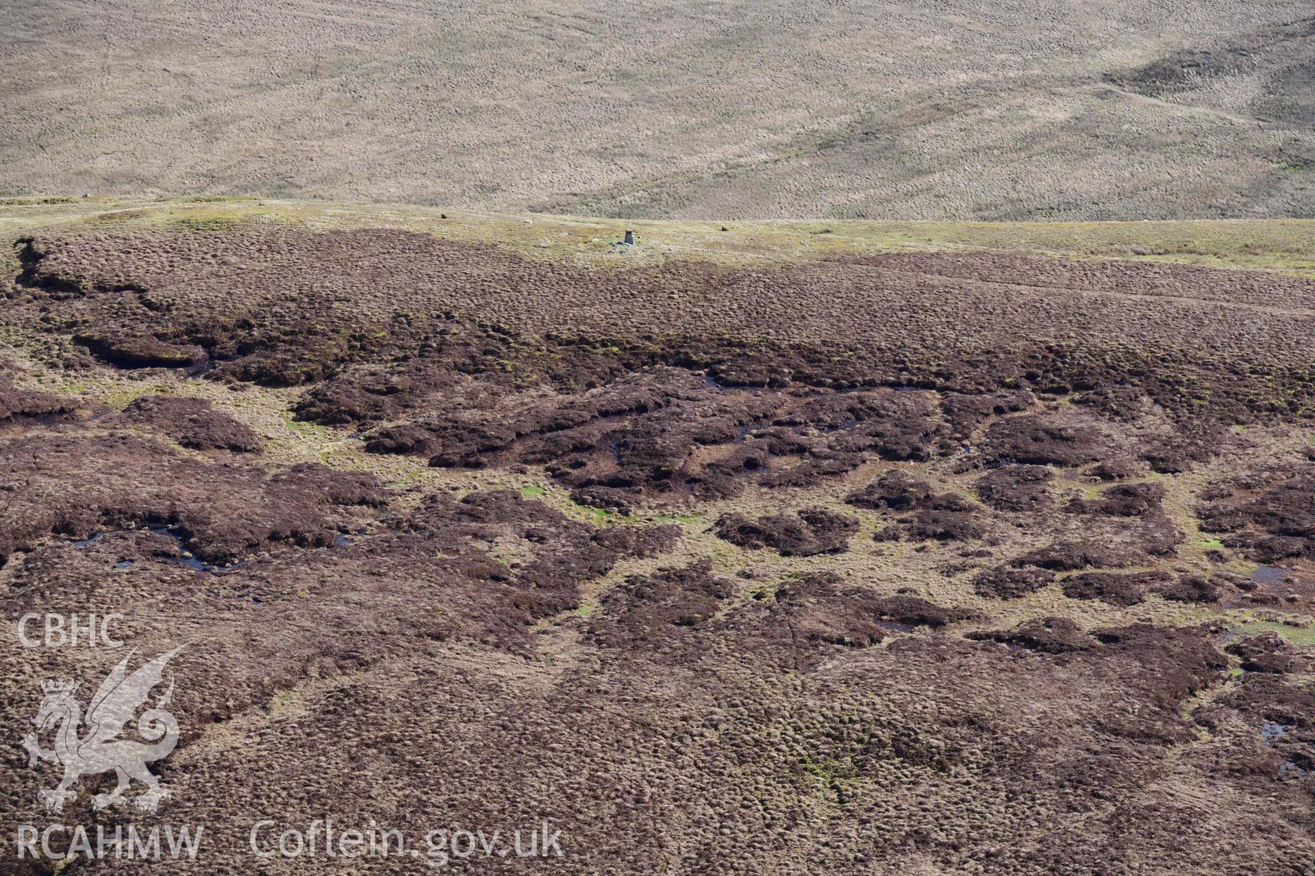 Y Gamriw south cairn. Oblique aerial photograph taken during the Royal Commission’s programme of archaeological aerial reconnaissance by Toby Driver on 14 March 2022.