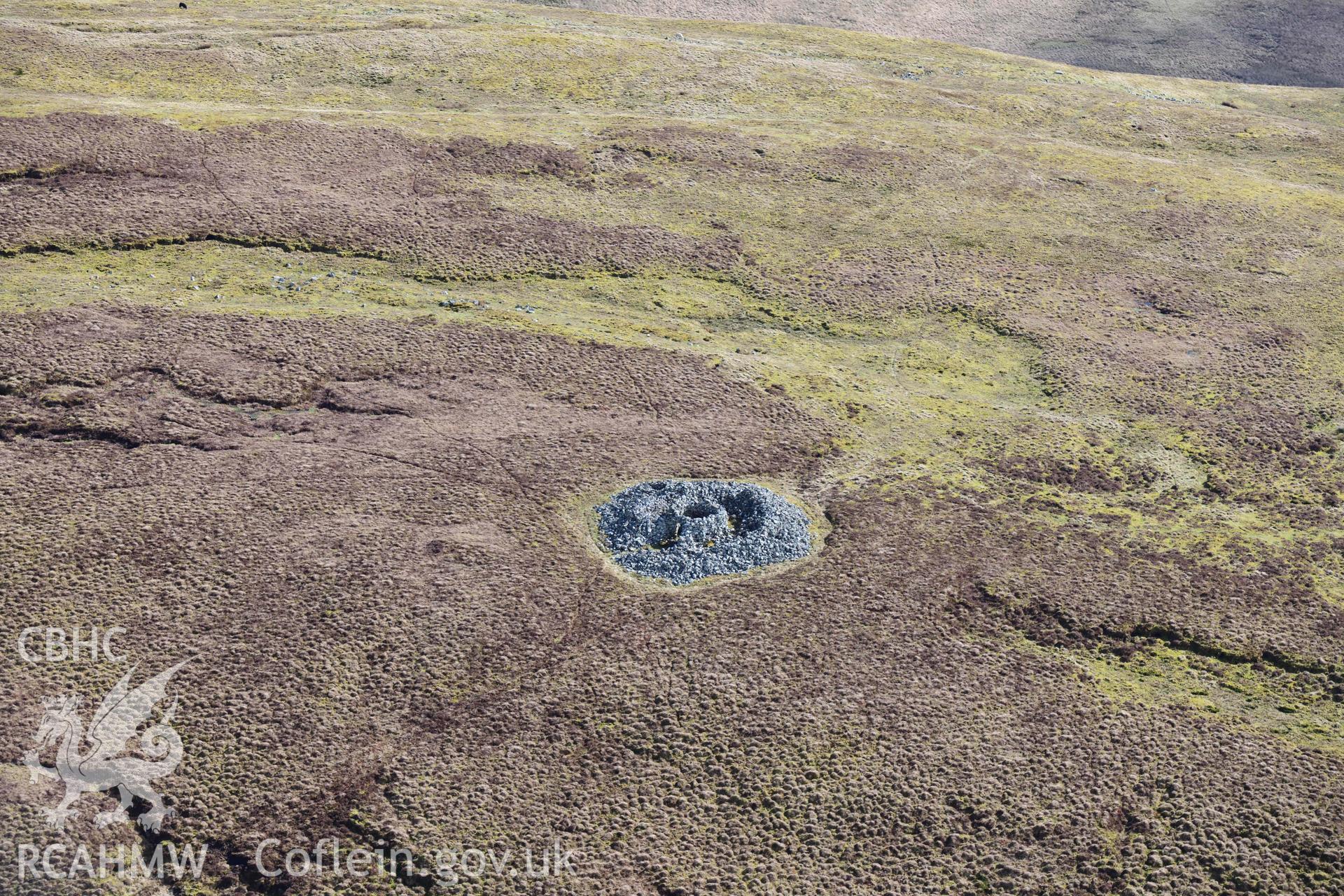 Y Gamriw south cairn. Oblique aerial photograph taken during the Royal Commission’s programme of archaeological aerial reconnaissance by Toby Driver on 14 March 2022.