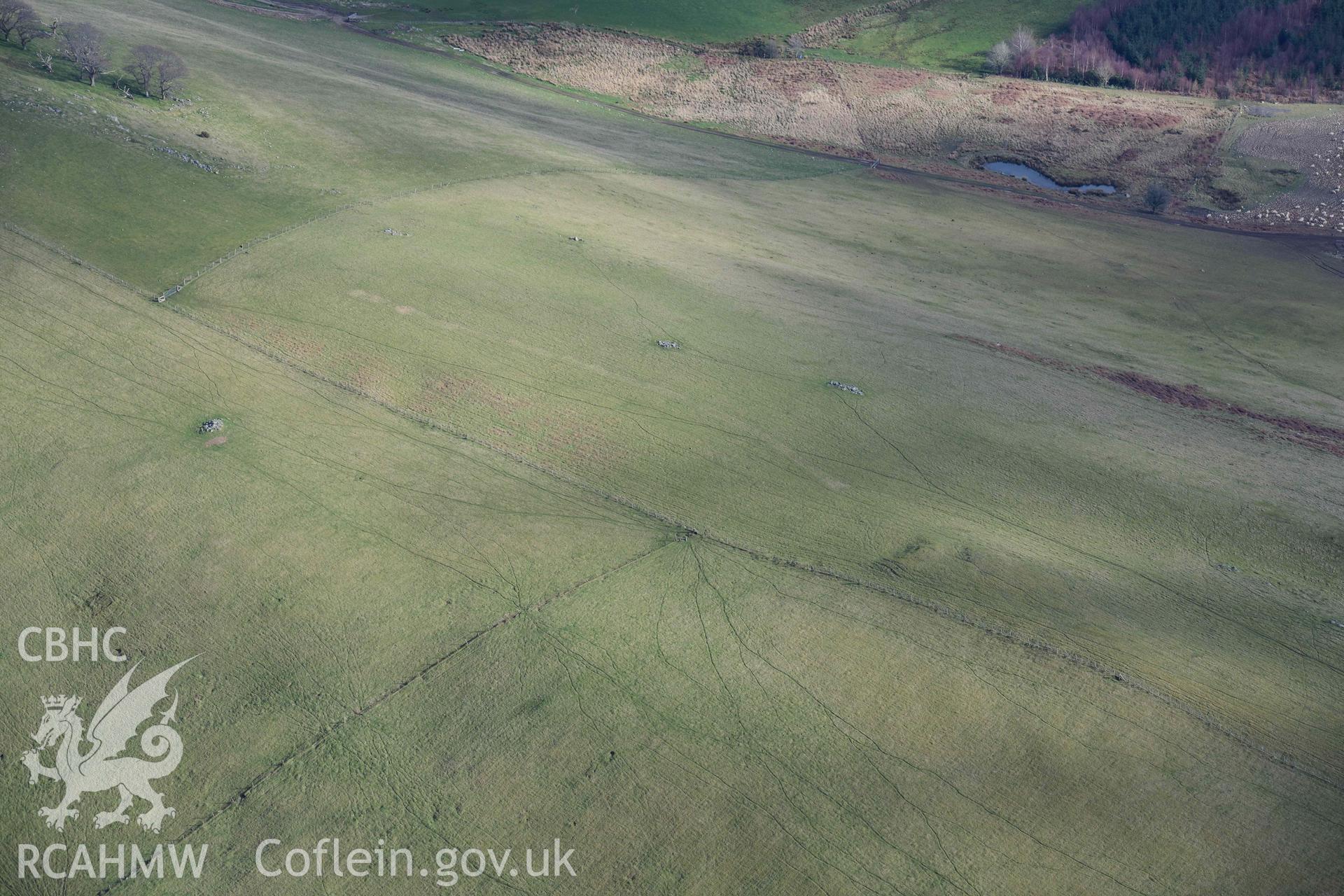 Dol y Fan cairn. Oblique aerial photograph taken during the Royal Commission’s programme of archaeological aerial reconnaissance by Toby Driver on 14 March 2022.