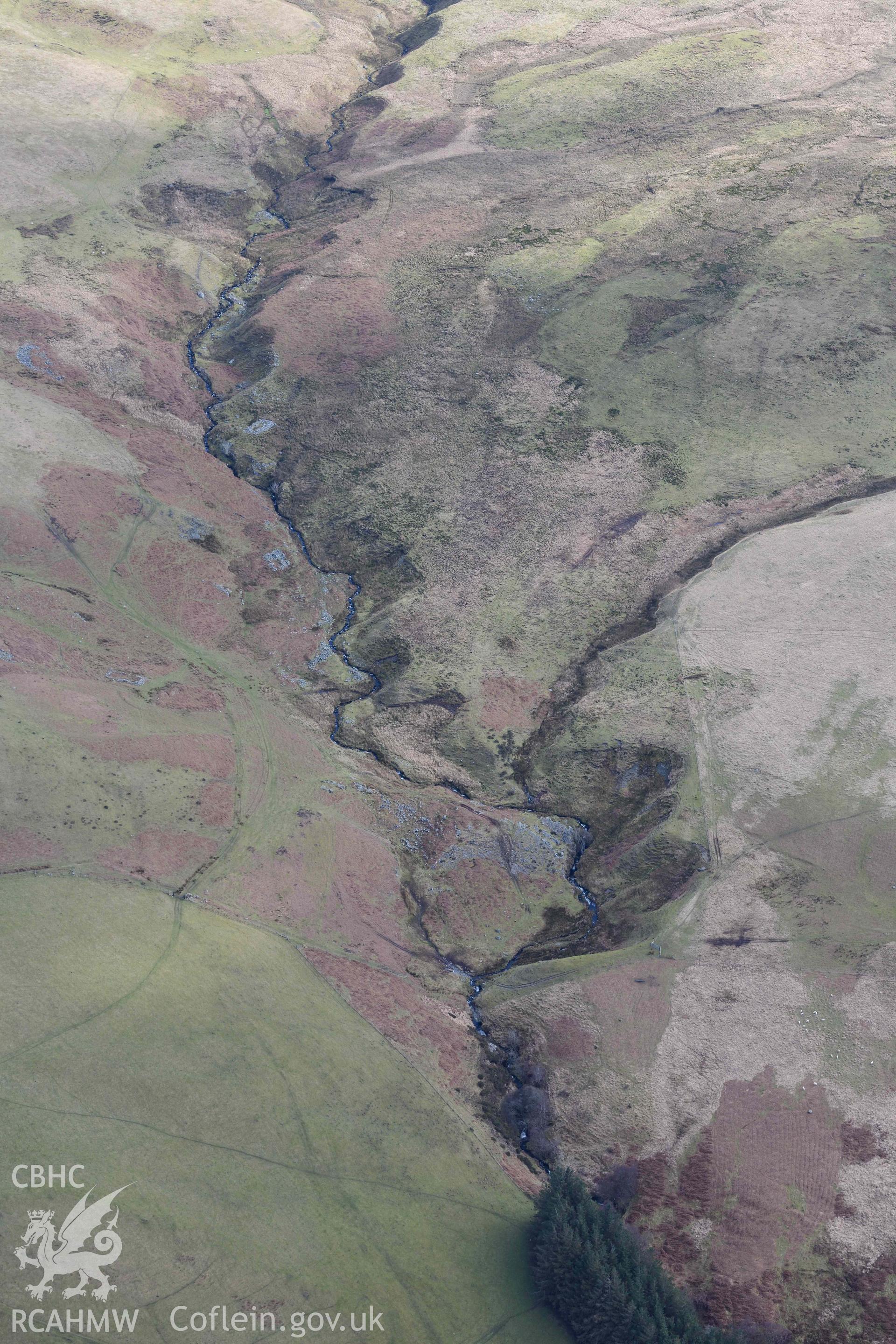 Esgair Gwar y Cae hafotau settlement, Nant Rhyd Goch. Oblique aerial photograph taken during the Royal Commission’s programme of archaeological aerial reconnaissance by Toby Driver on 14 March 2022.