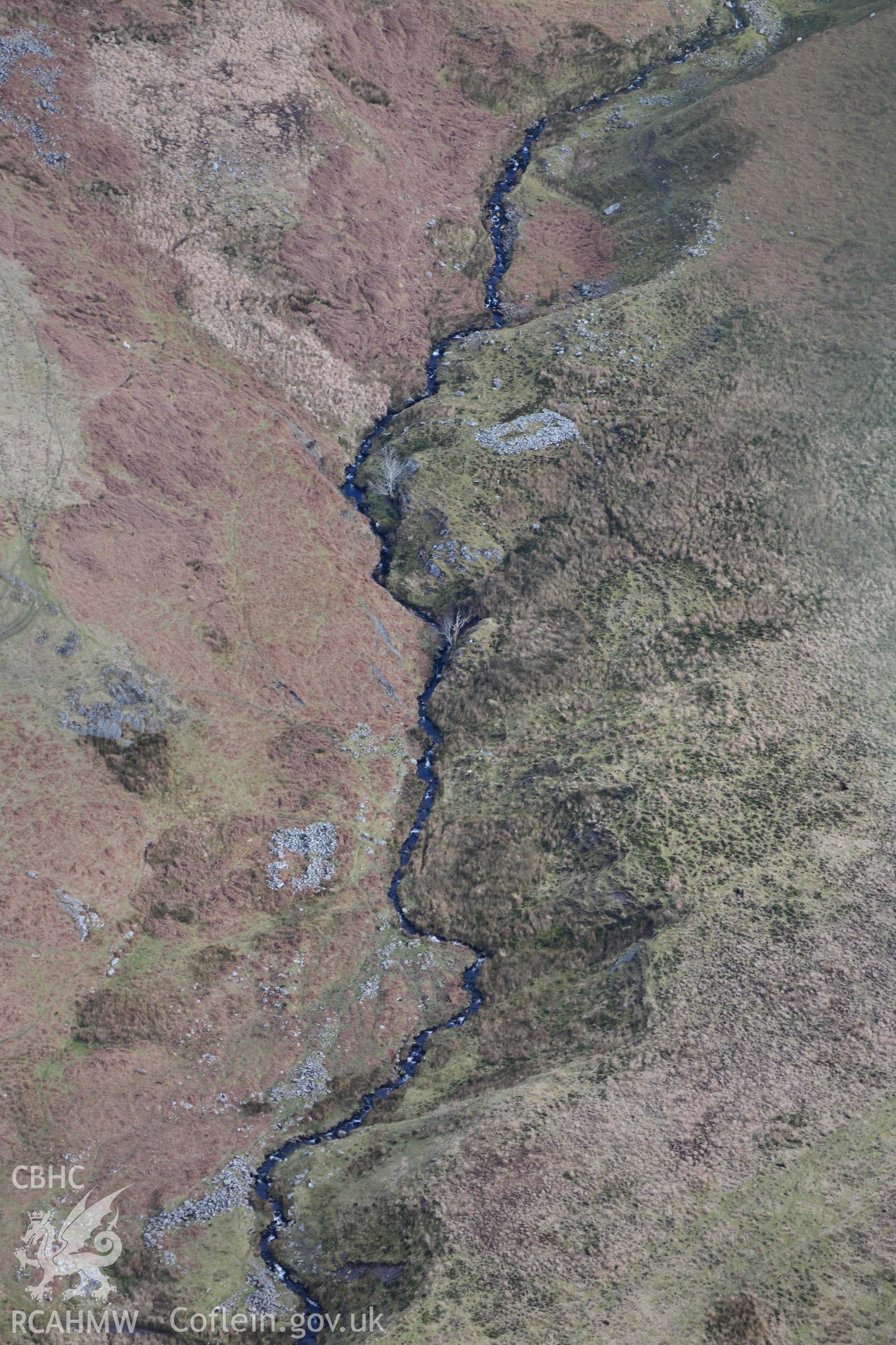 Esgair Gwar y Cae hafotau settlement, Nant Rhyd Goch. Oblique aerial photograph taken during the Royal Commission’s programme of archaeological aerial reconnaissance by Toby Driver on 14 March 2022.