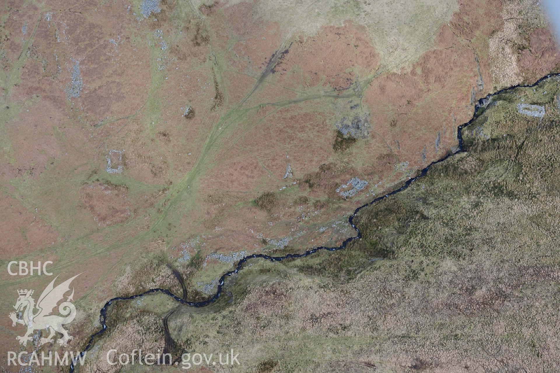 Esgair Gwar y Cae hafotau settlement, Nant Rhyd Goch. Oblique aerial photograph taken during the Royal Commission’s programme of archaeological aerial reconnaissance by Toby Driver on 14 March 2022.