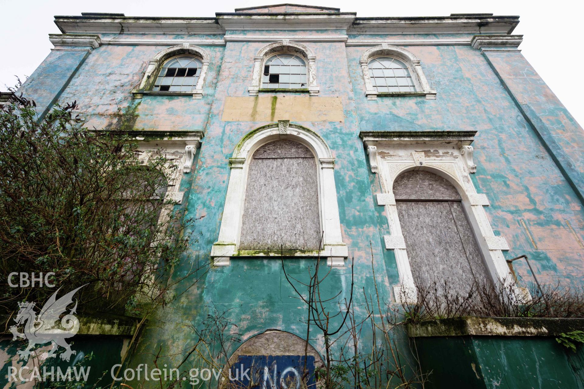 West front façade, looking up. Boarded up windows and doors. Poor condition. Perrots Road Wesleyan Methodist Chapel, Haverfordwest. Part of a photographic survey conducted by Meilyr Powel on 20 February 2023.